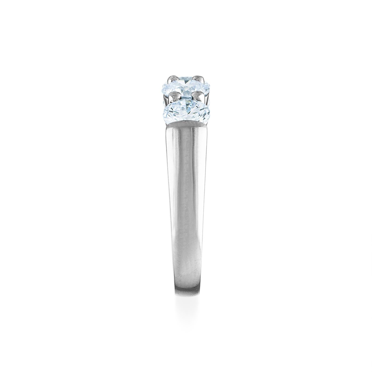 Metal: Platinum
Diamond Shape: Round Brilliant
Total Diamond Weight: 2.00 CTW
Number of Diamonds: 5
Size: 7
Clarity: Very Slightly Included ( VS2 )
Color: Near Colorless ( I )