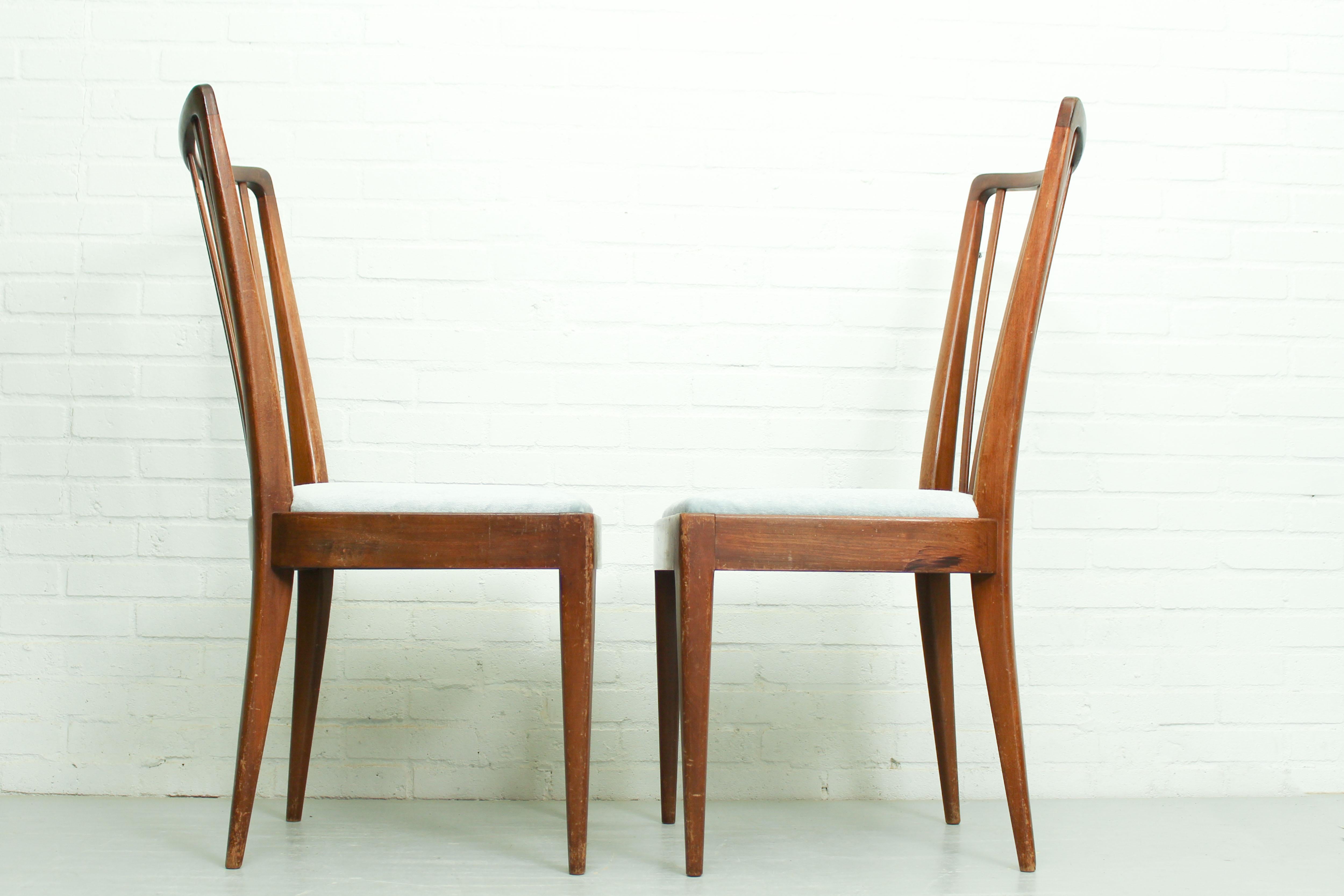 Set of two dining chairs designed by Abraham A. Patijn for Zijlstra Furniture in the Netherlands. The chairs are made out of walnut and are upholstered with beautiful light blue mohair fabric. This design is similar with chairs from Ole Wanscher,