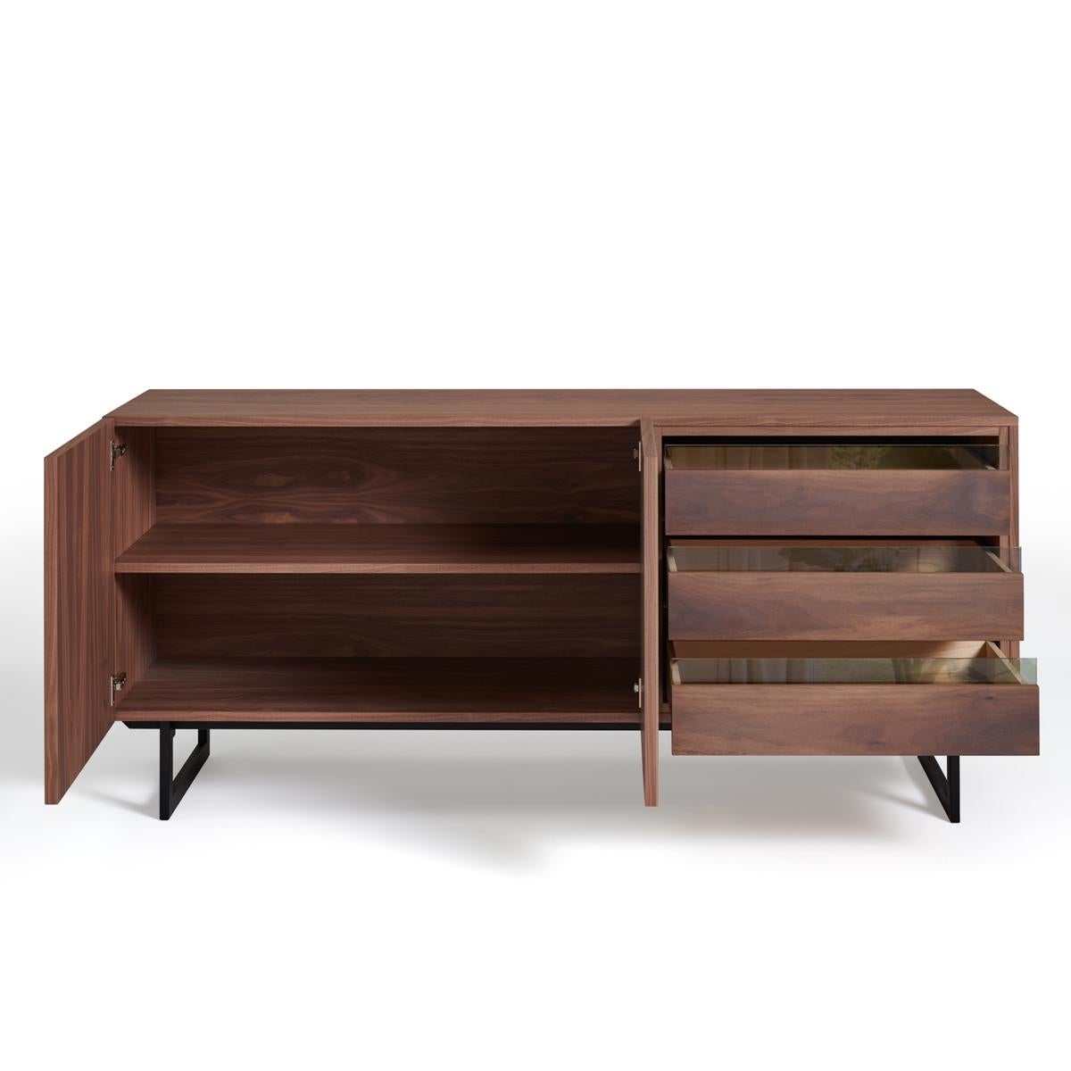 Modern 2- door 3-drawer sideboard in walnut & black iron feet, design by C. Lecomte For Sale