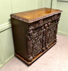 2 Door Carved Gothic Oak Cupboard, Sideboard This is an unusual design