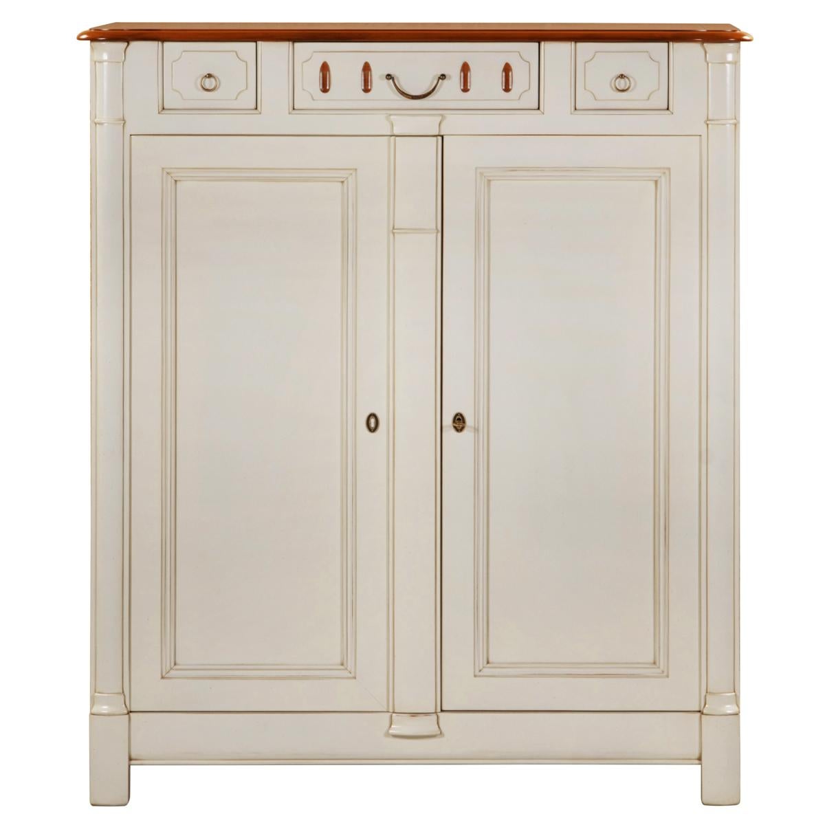 This tall and massive 2-door cabinet table is typical of French classical furniture pieces and belongs to our TRADITION collection which takes up the timeless classics of the charm of the French countryside.

The pilasters, the grooves and the