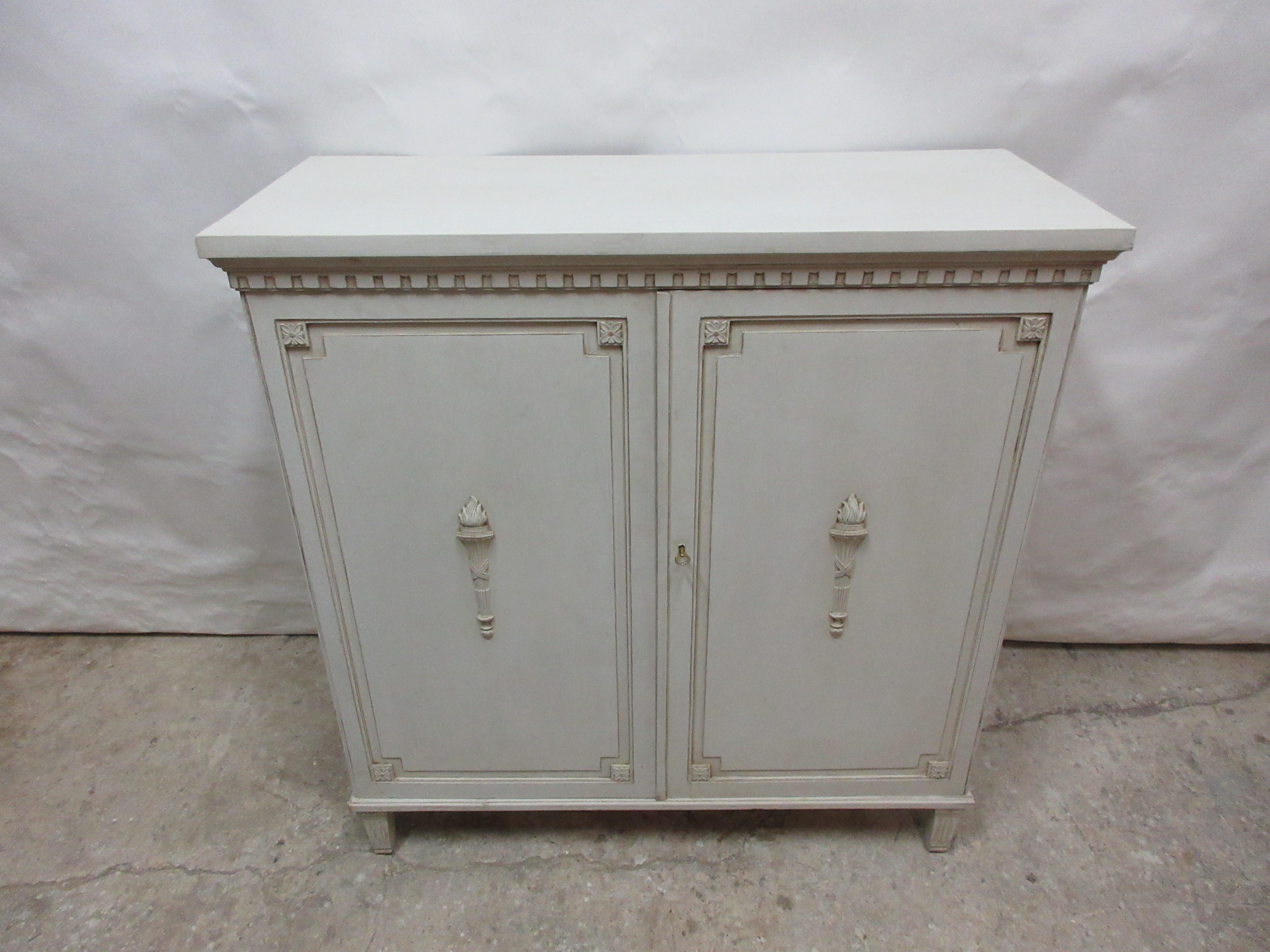 This is a very unique 2 door Gustavian style sideboard. It has been restored and repainted with Milk Paints 