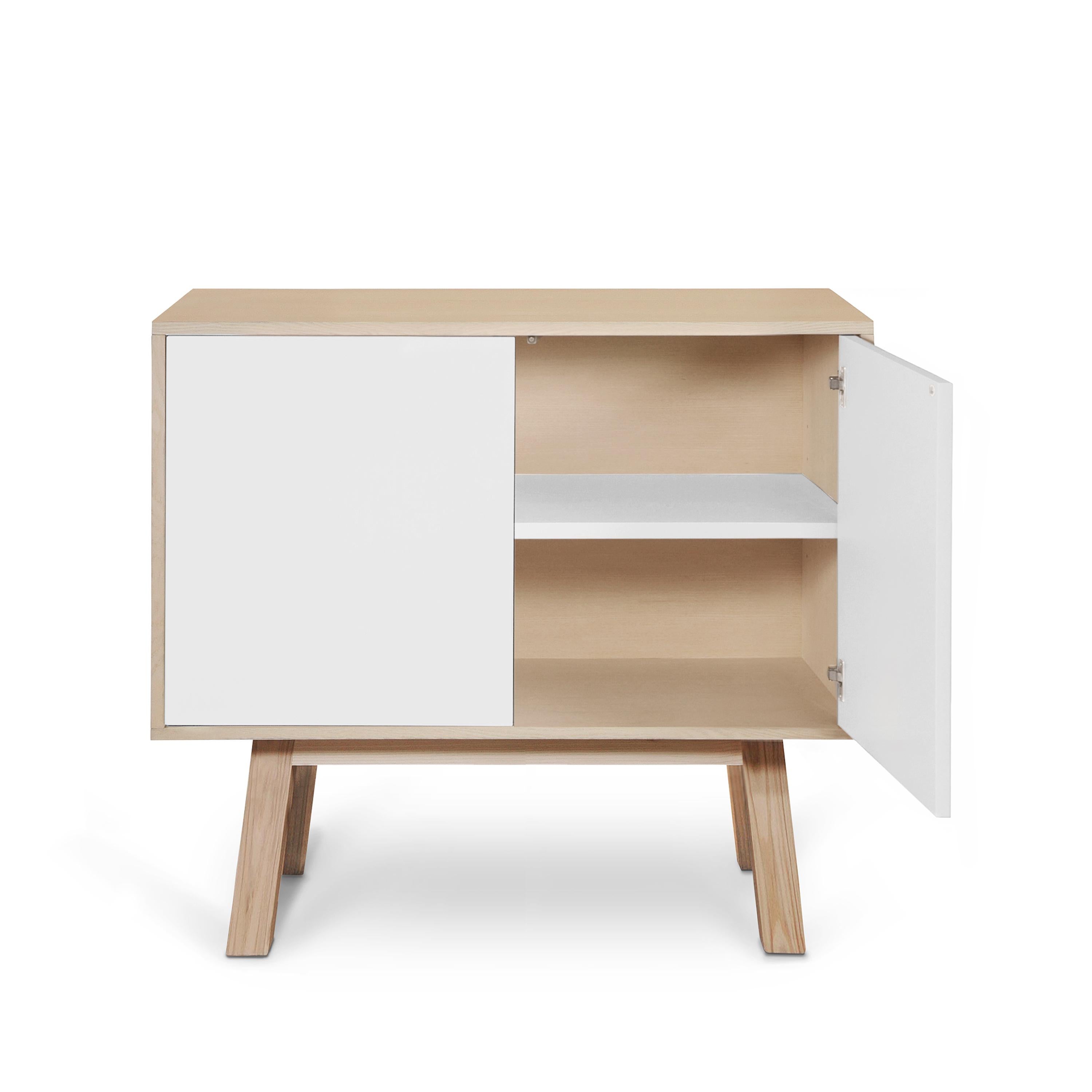 Contemporary 2-door scandinavian cabinet by Eric Gizard, Paris white + 10 other colours For Sale