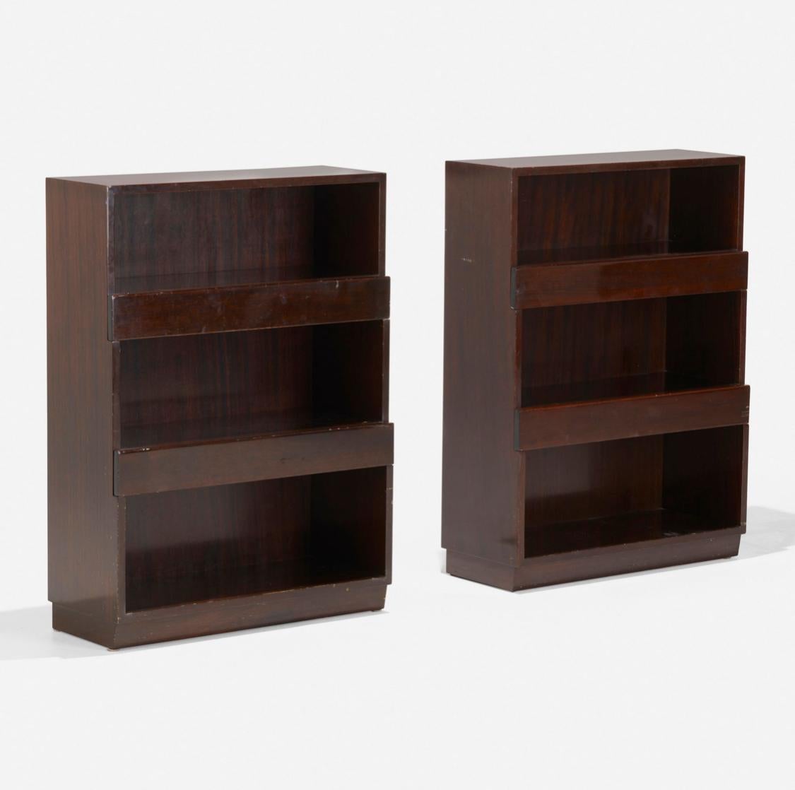 Introduced in 1933, these wonderful two-drawer open bookcases are from one of Edward Wormley’s first Modern collections  for Dunbar Furniture. The streamlined design feels as fresh and contemporary today as it did almost 100 years ago. 

Veneered in