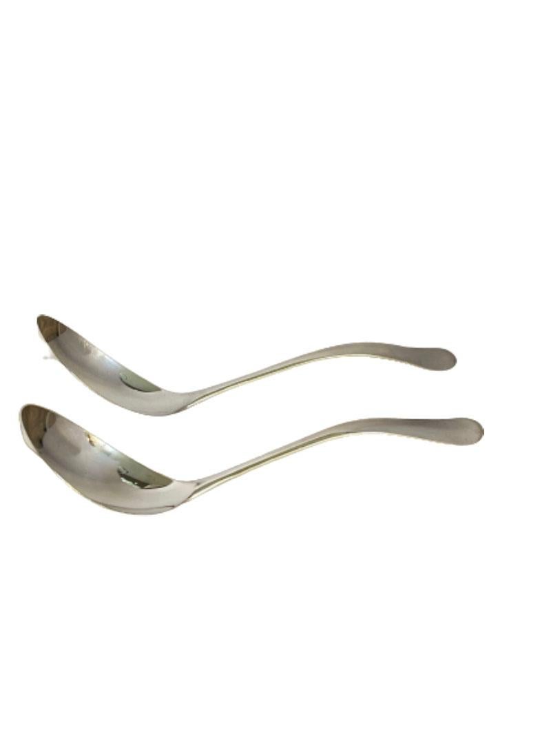 2 Dutch Silver serving spoons by Gerritsen & van Kempen

2 Dutch silver serving spoons with pattern 
