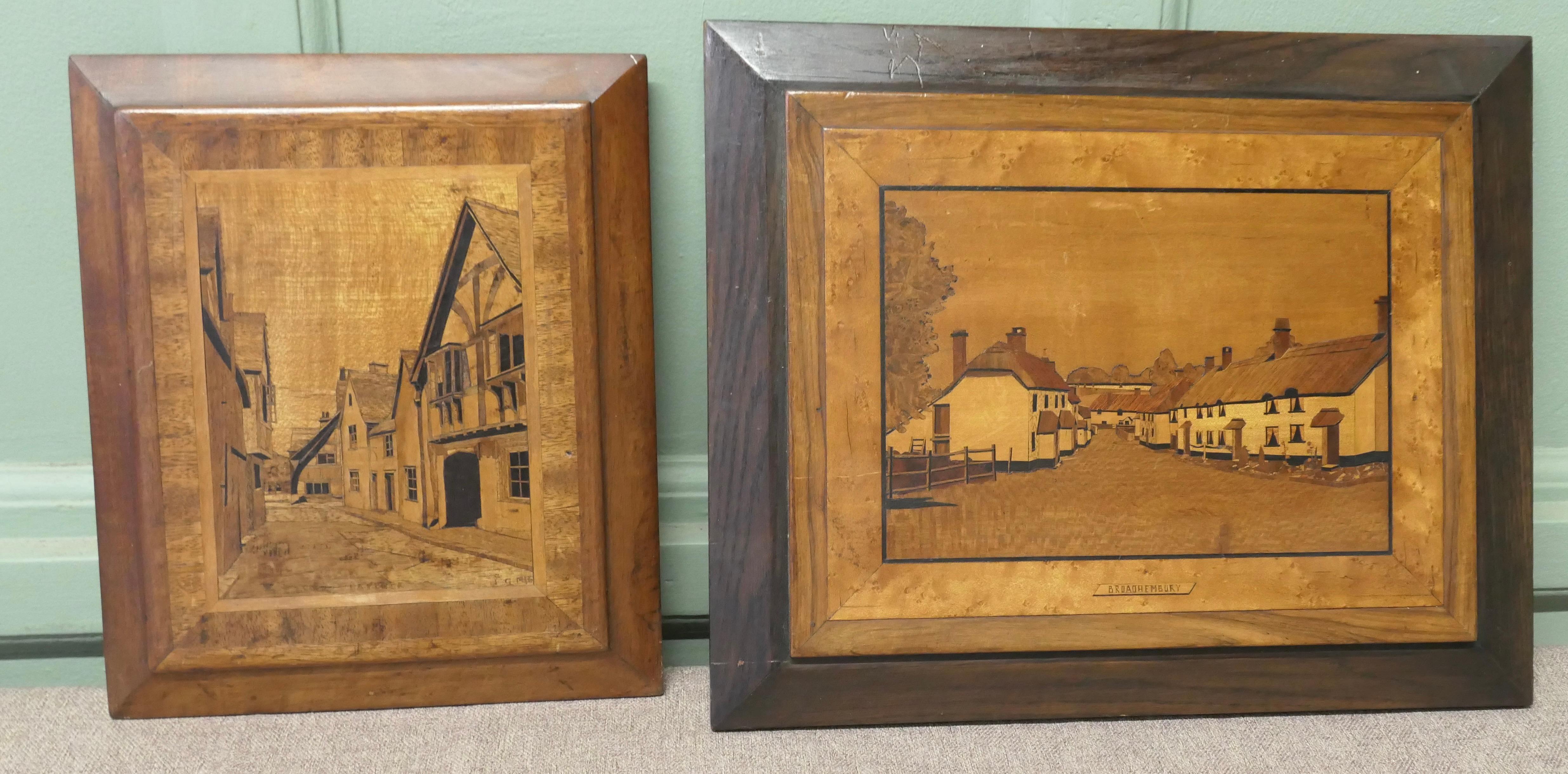 2 Early 20th Century Marquetry Pictures 
Laycock 1946, and Broadhembury
Beautiful pieces in very nice condition 14” high 17” wide 
Aw93
