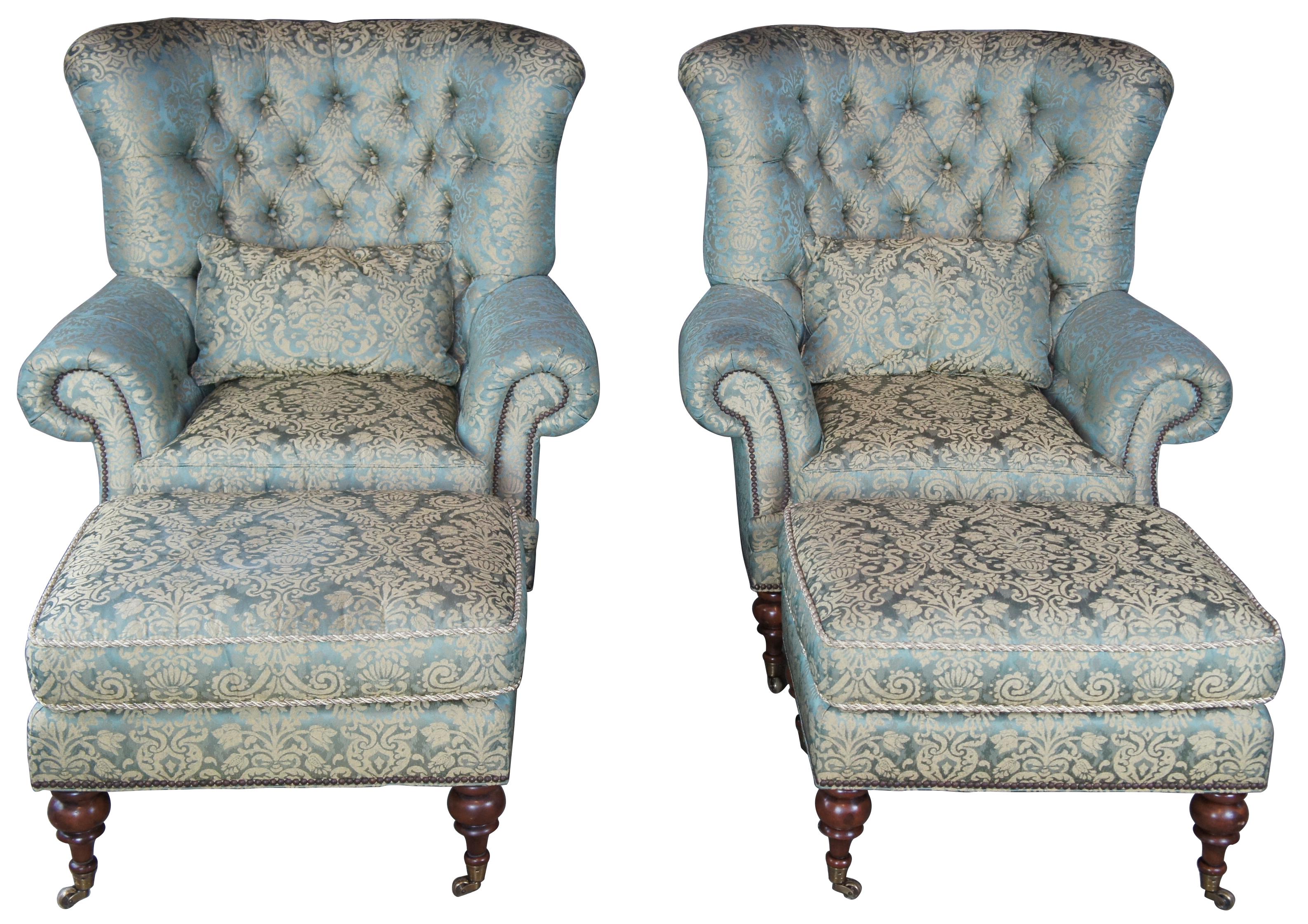 2 EJ Victor Beacon Hill wingback Kensington tufted arm wing chairs and ottomans

The Kensington wingchair by EJ Victor features a pronounced wing-back with tufted cushion, antiqued nailhead trim and turned front legs over brass castors.