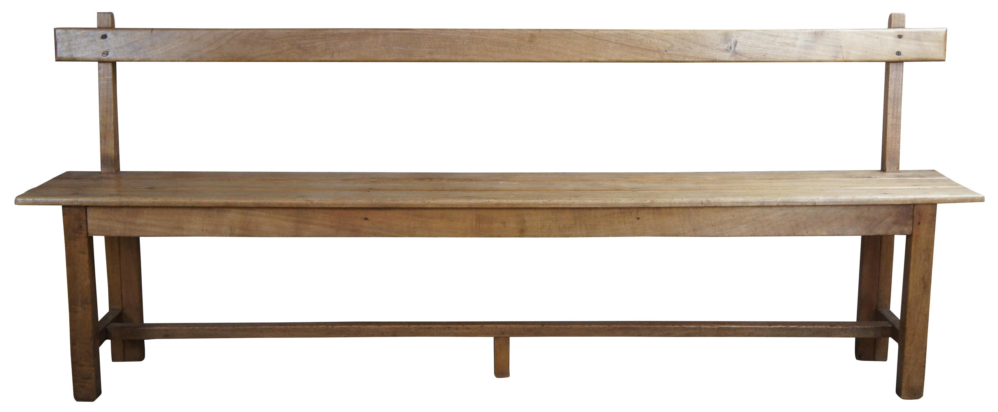 2 European farmhouse tulip wood benches, circa late 20th century. 

Benches vary slightly, measurements approx. 76