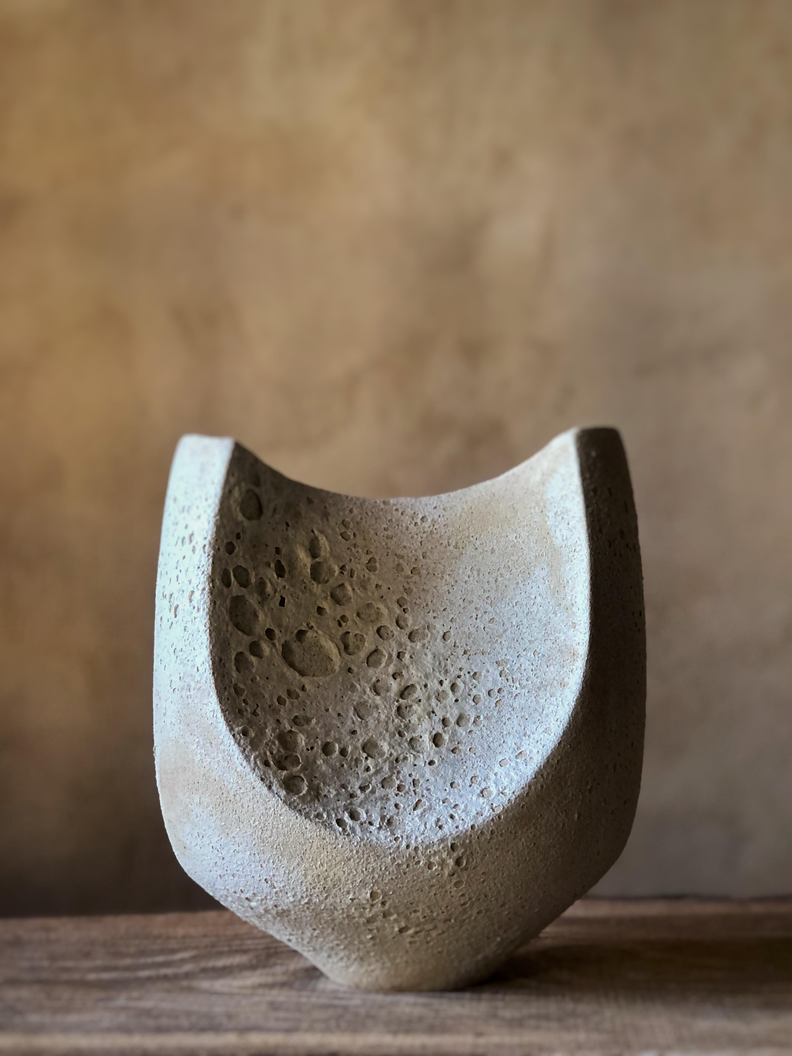 2 Facetted Vase With White Crackle Glaze by Sophie Vaidie
One Of A Kind.
Dimensions: D 10 x W 19 x H 23 cm. 
Materials: Stoneware with white crater glaze.

In the beginning, there was a need to make, with the hands, the touch, the senses. Then came