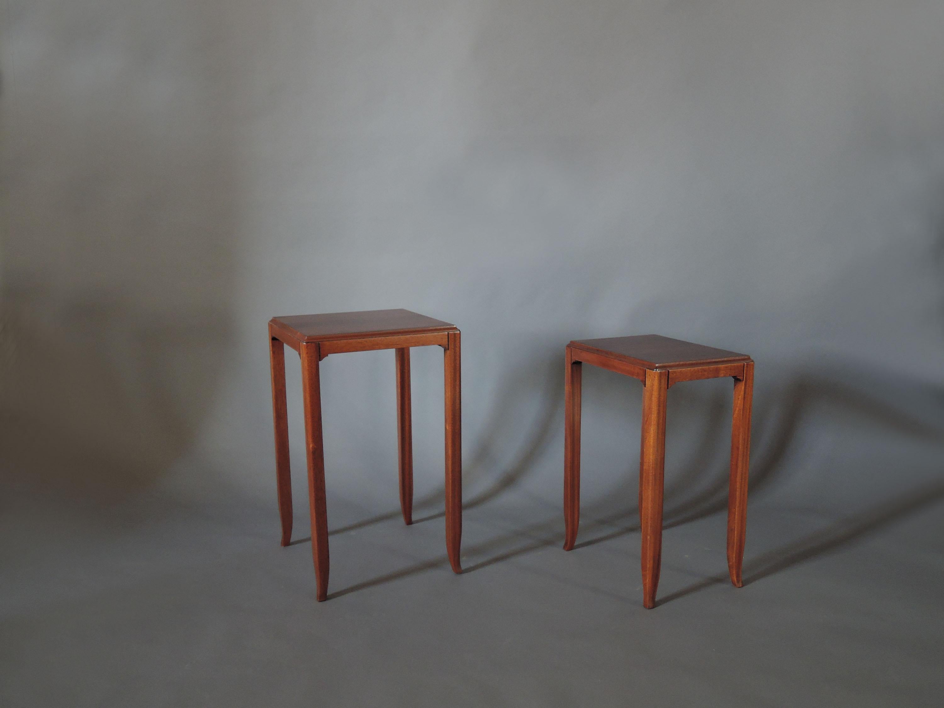 Two fine French Art Deco side tables by Jules Leleu with a solid mahogany base and a rosewood veneered top. 
Stamped.

Dimensions:
Bigger one is H 25