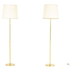 2 Lampadaires français en laiton avec abat-jour en papier beige, 1950