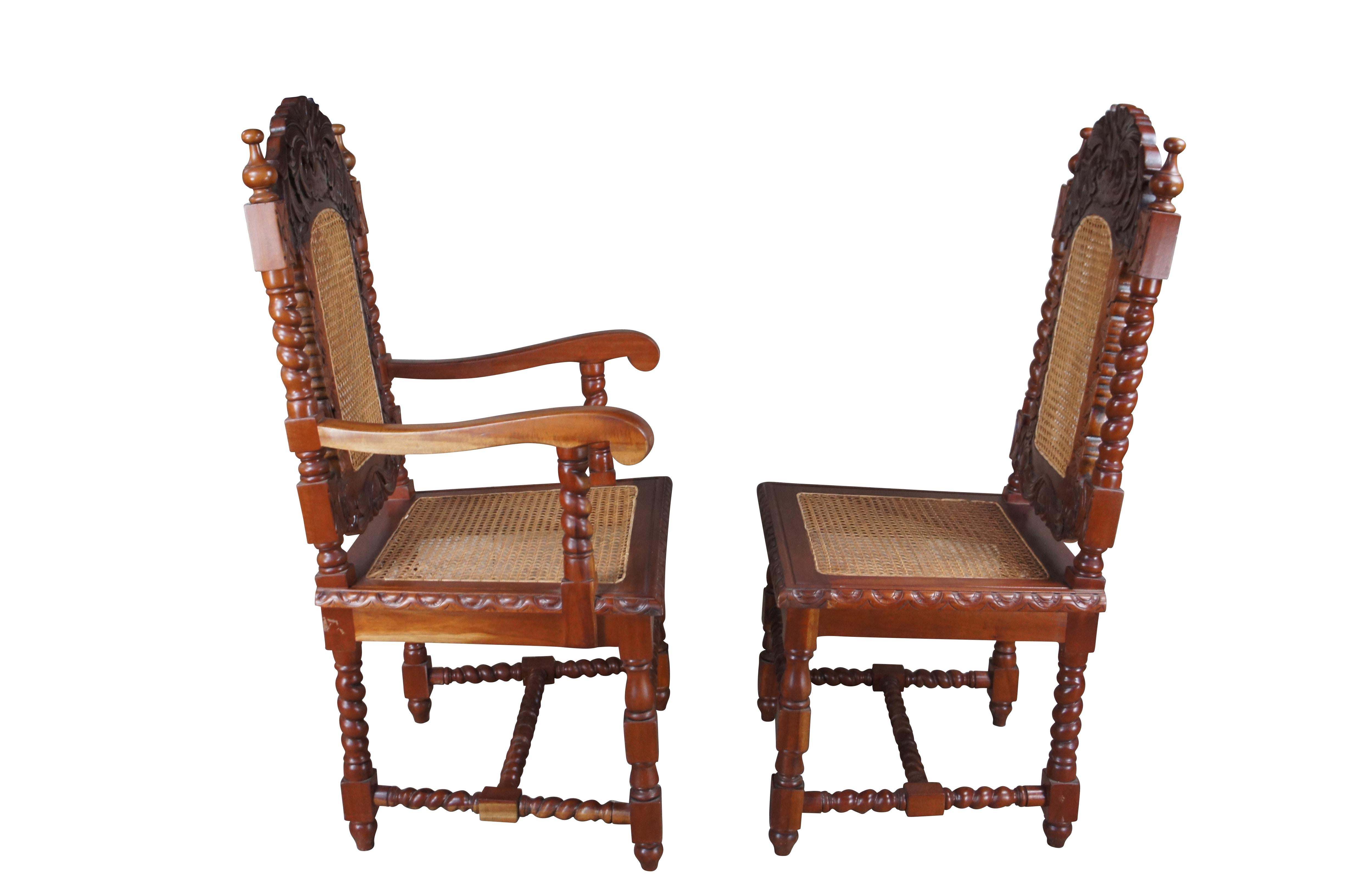 French Louis XIII dining arm and side chair. Made from mahogany with a carved and pierced acanthus foliate back with barley twist supports. Features a double cane back and cane seat. Legs are connected by an H stretcher with turnip feet. Made in