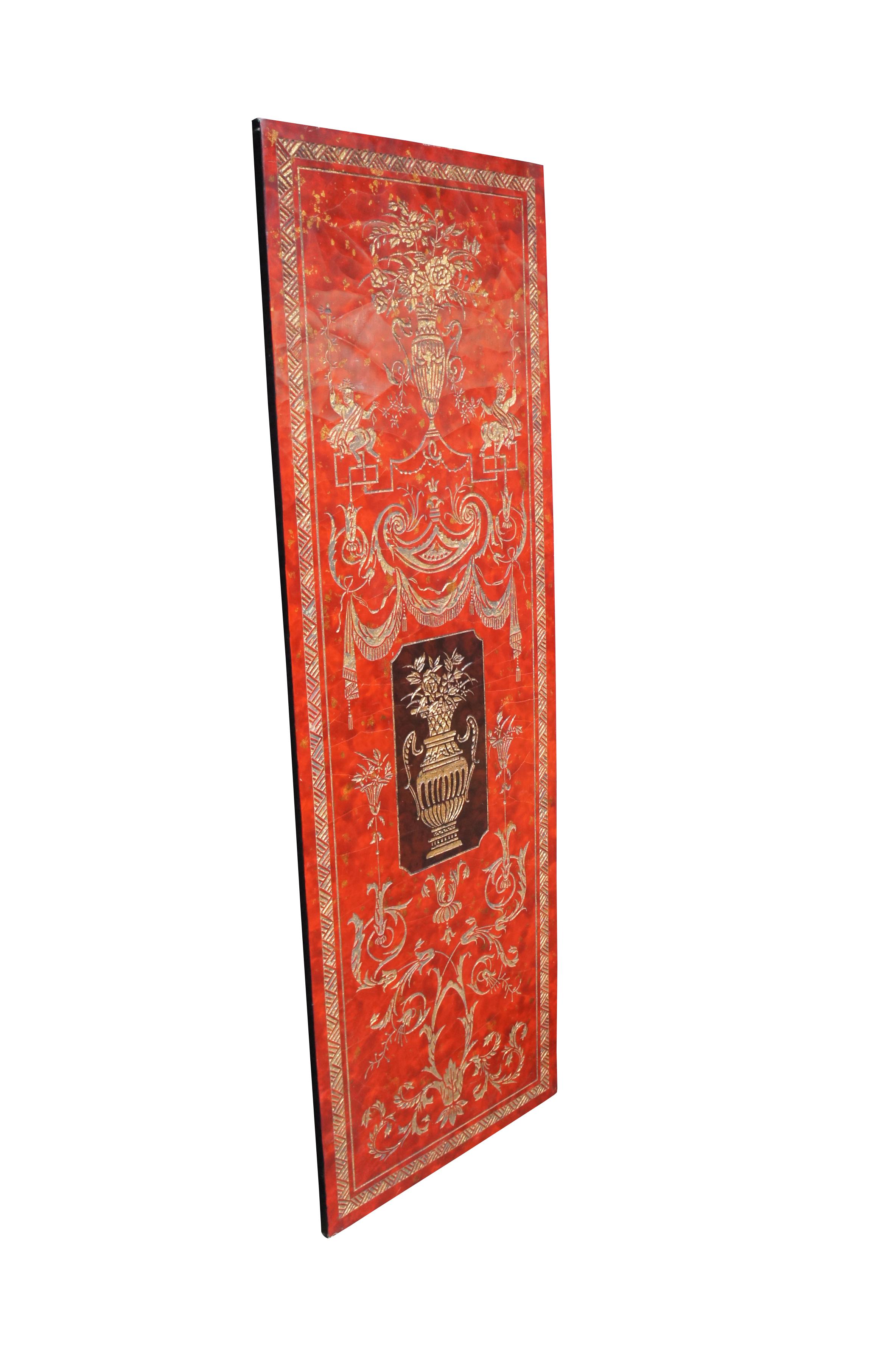Impressive pair of late 20th century wall hanging panels.  Features Neoclassical and French styling.  The screen is red lacquered with a marbled appearance and engraved in gold designs with ornate urns, acanthus accents and Centaurs (half man half