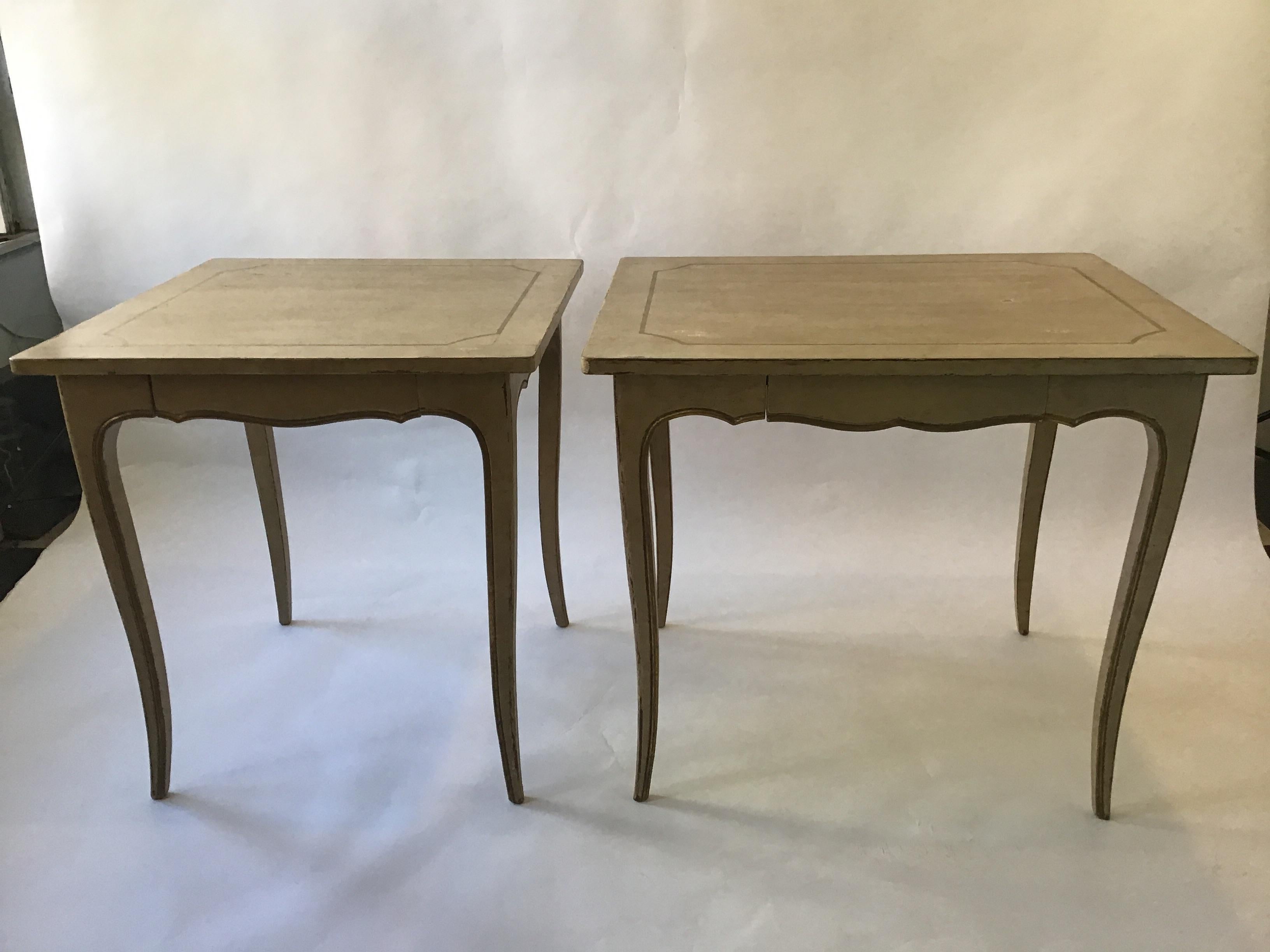 2 French style painted end tables. One table is larger than the other.