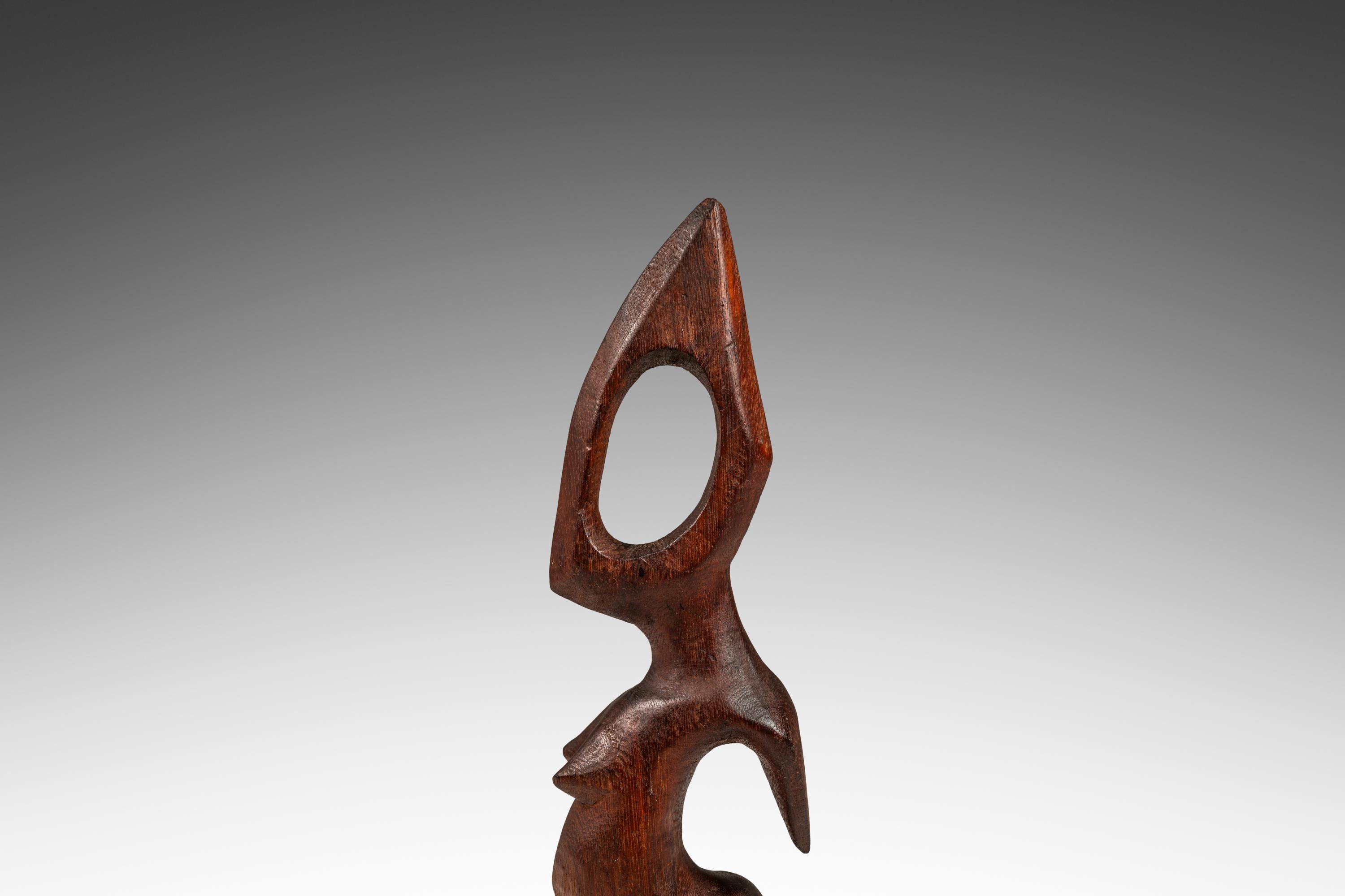 2 ft Pregnant Humanoid Sculpture Carved from Solid Mahogany, West Africa, 1970's in vendita 1