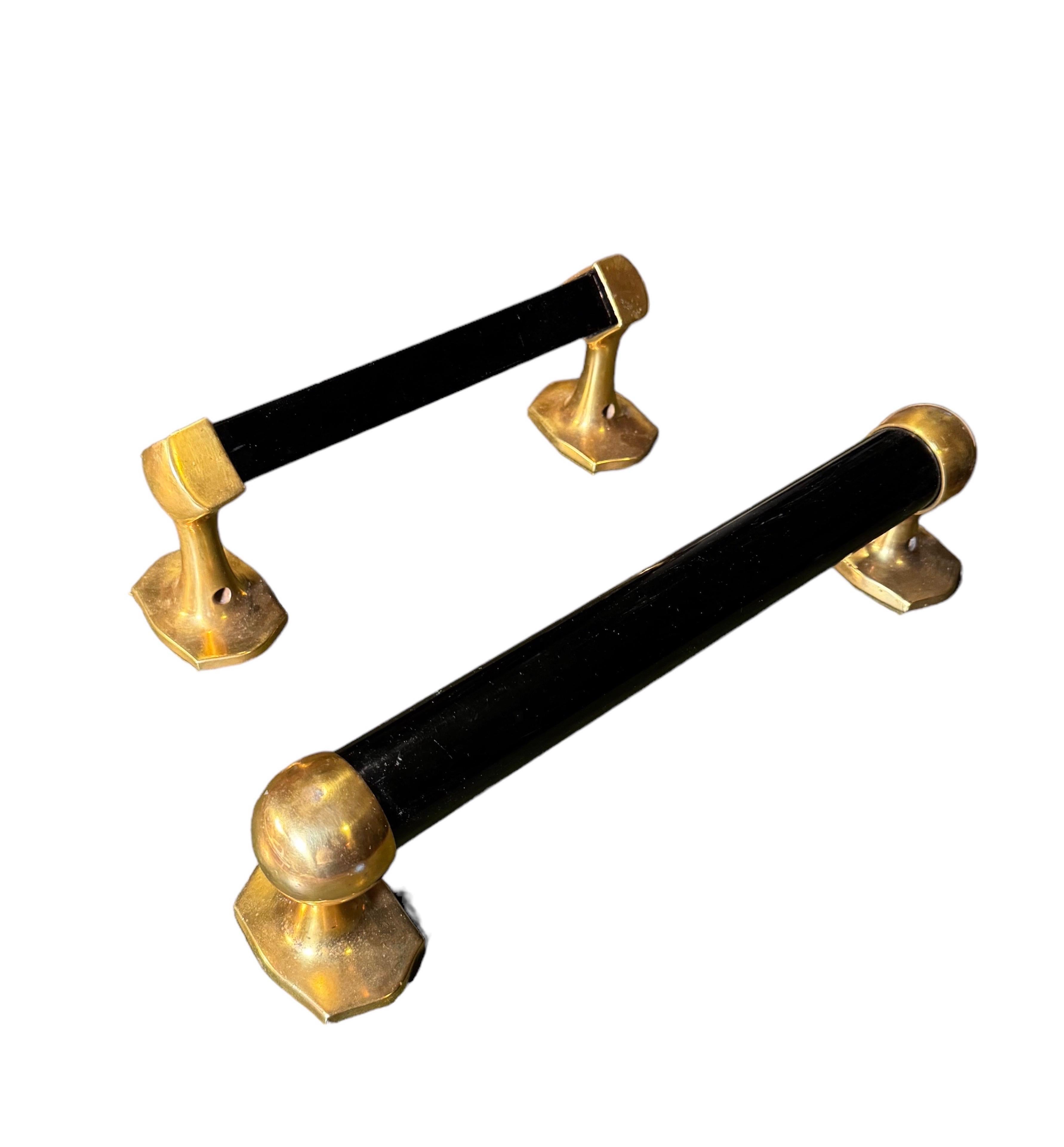 2 Gilt-Bronze & Black Glass Hand Towel Racks
With Mounting hardware 

The large bar,  14” X 3”  X 4”

Smaller bar,  10.5 X  3” X 4” 