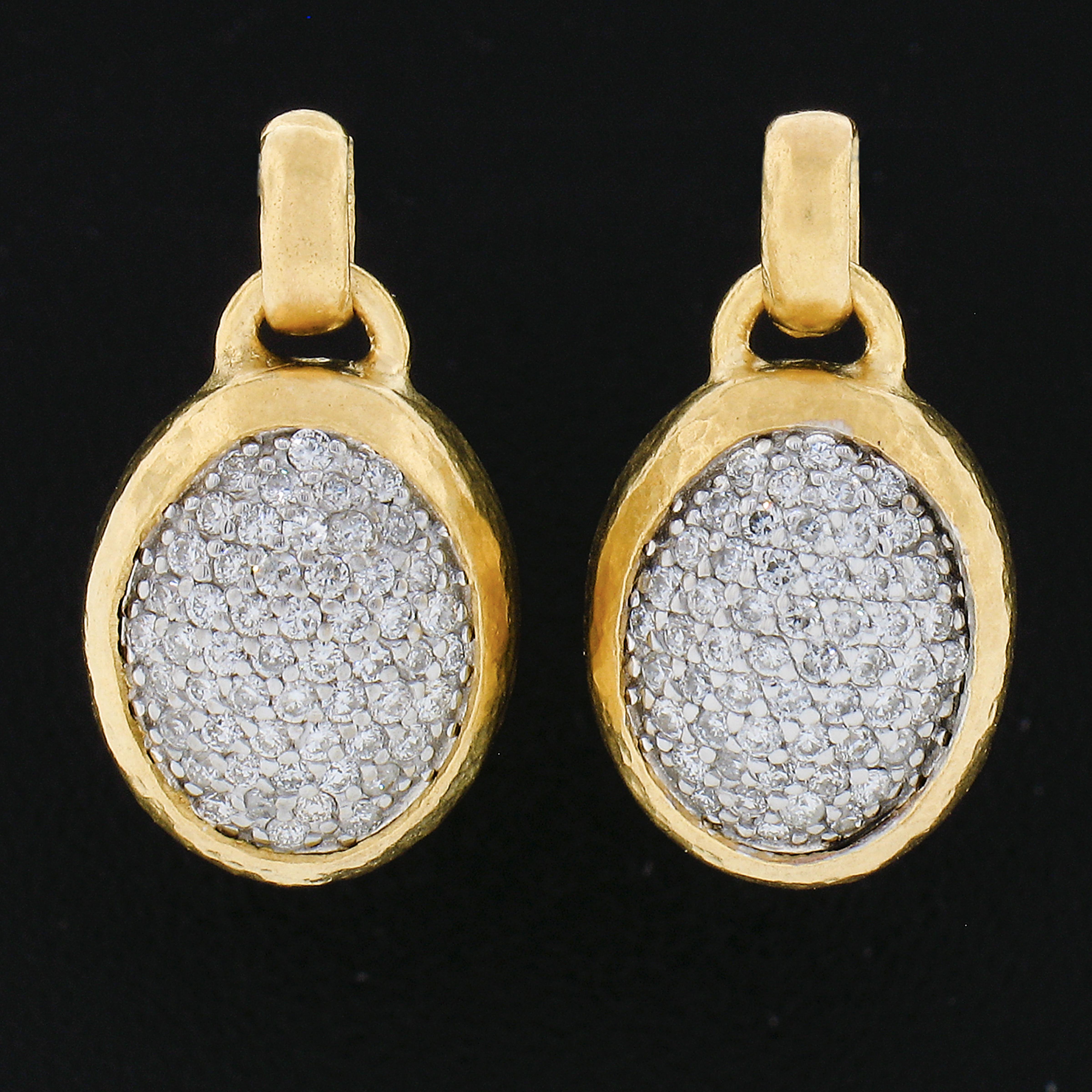 Here we have an absolutely elegant pair of pendants by GURHAN that are crafted in solid 24k yellow gold & 18k white gold at the center.  They feature an oval design adorned with numerous round brilliant cut natural diamonds totaling approximately