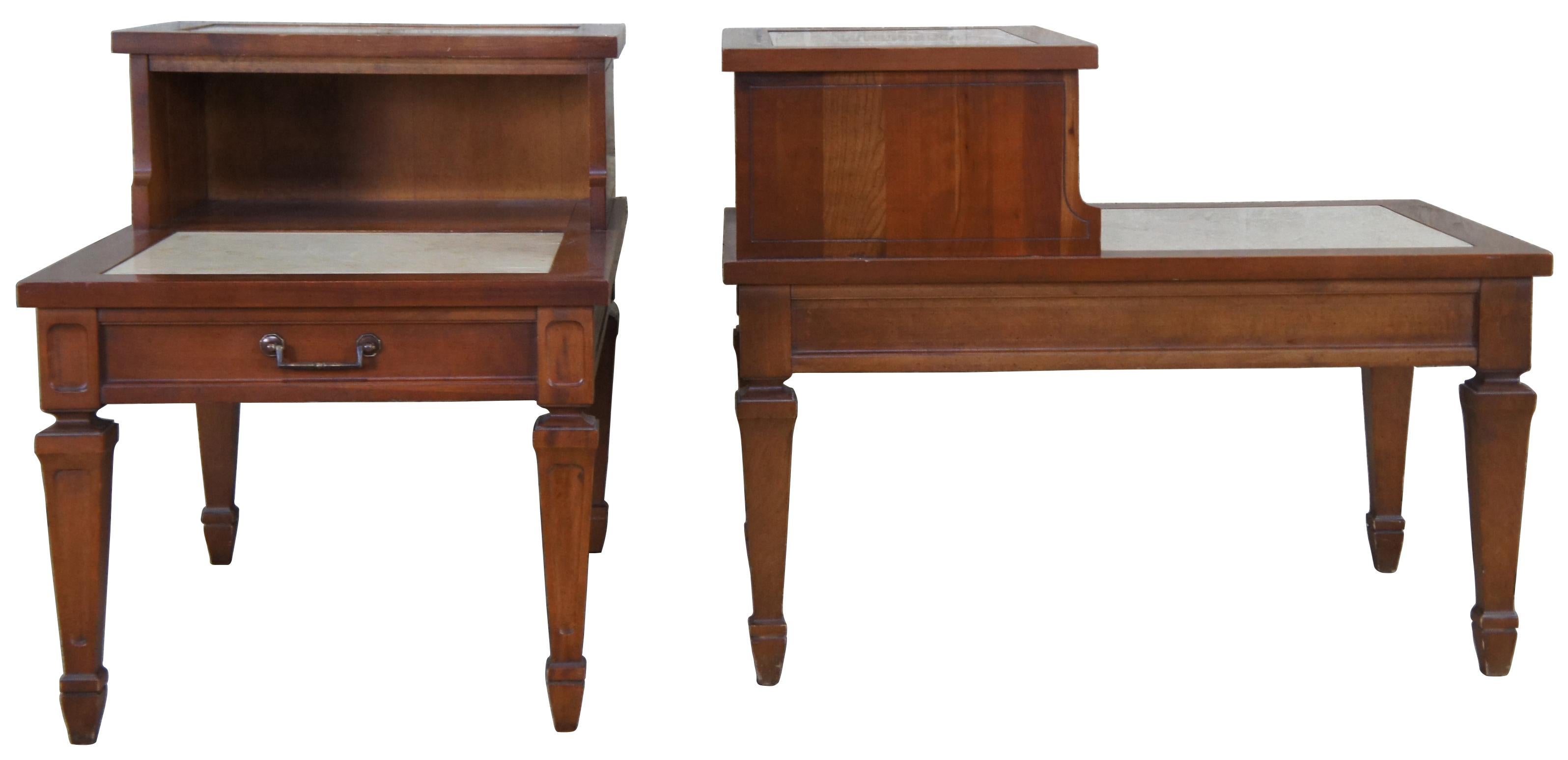 Set of two vintage Hammary end or side tables. Made of cherry featuring one drawer, tapered legs and two inset marble slabs made in Portugal.

Measures: 18