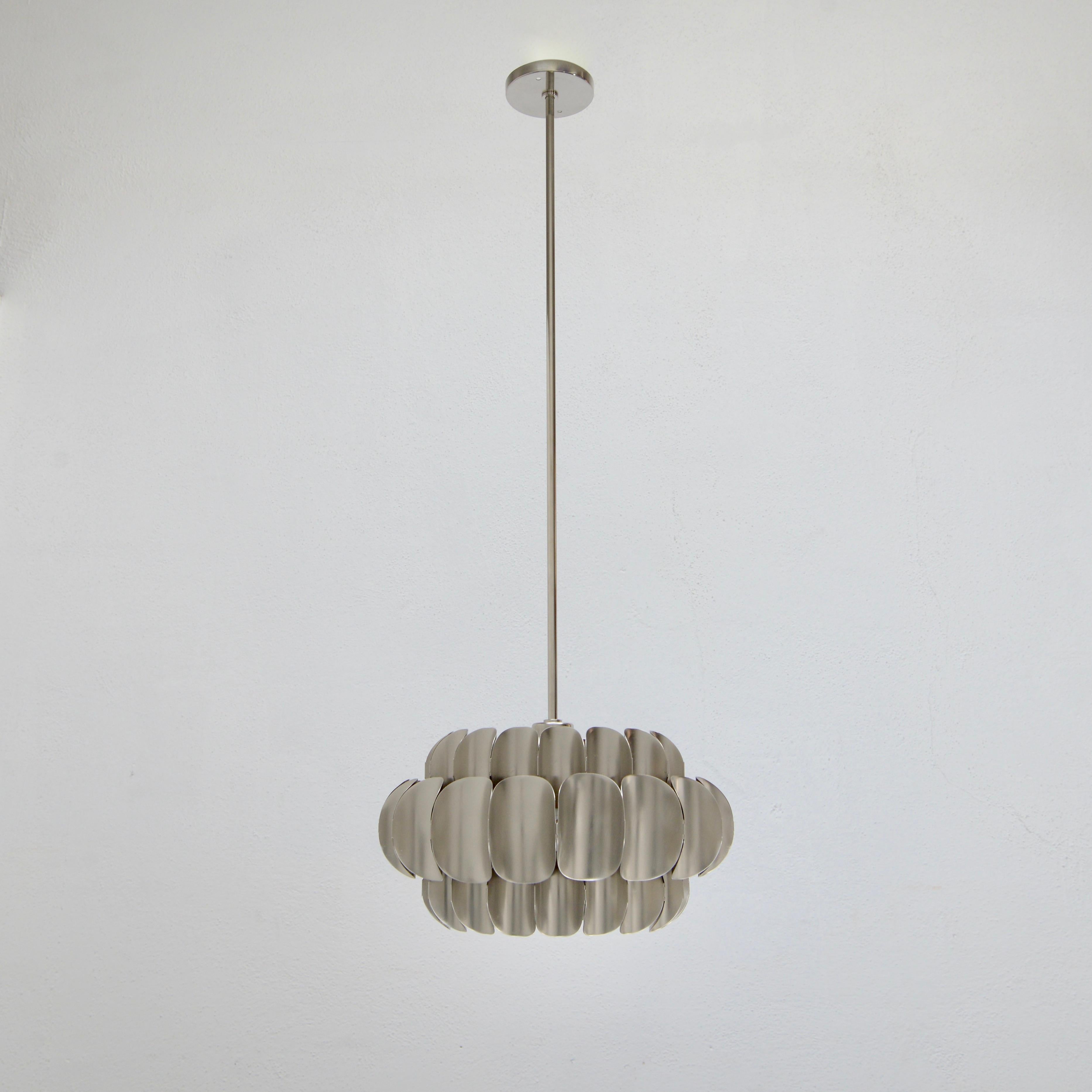 Beautiful nickel-plated steel pendant with acrylic diffuser by Hans Agne Jakobsson from 1950s Sweden. Partially restored, with original nickel plated steel finish. Rewired for the US with a single E26 medium based socket.. Lightbulb included with