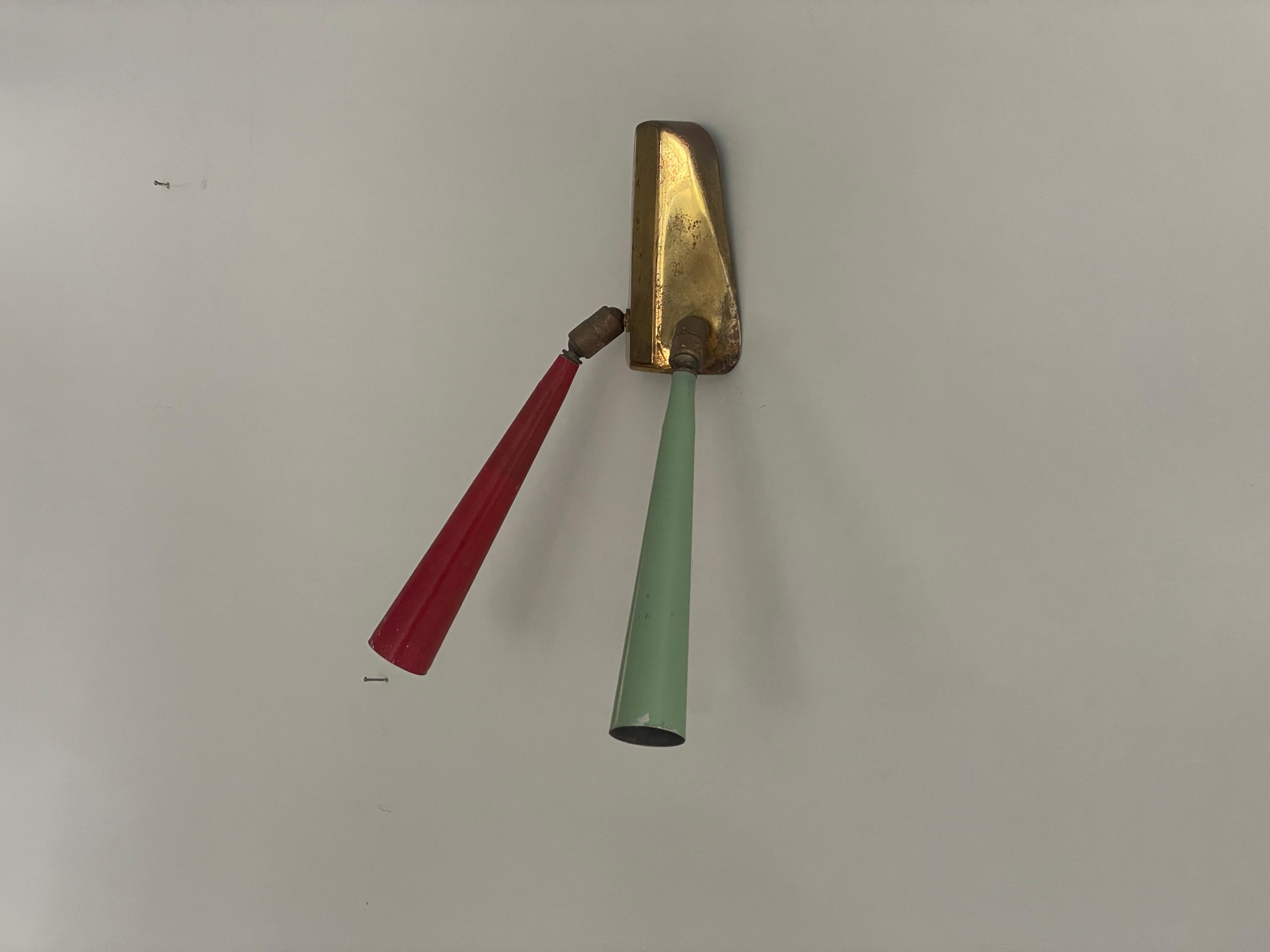 2-head Red and Green Brass Sputnik Wall Lamp, 1950s, Italy

Lampshade is in very good vintage condition.

Both the head and the rod are adjustable

This lamp works with 2x E14 light bulbs. 
Wired and suitable to use with 220V and 110V for all