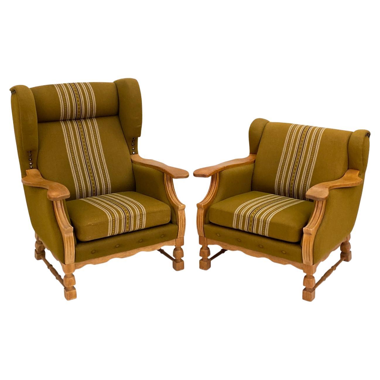 (2) Henning Kjaernulf Danish Mid-Century Carved Oak "His & Hers" Lounge Chairs For Sale