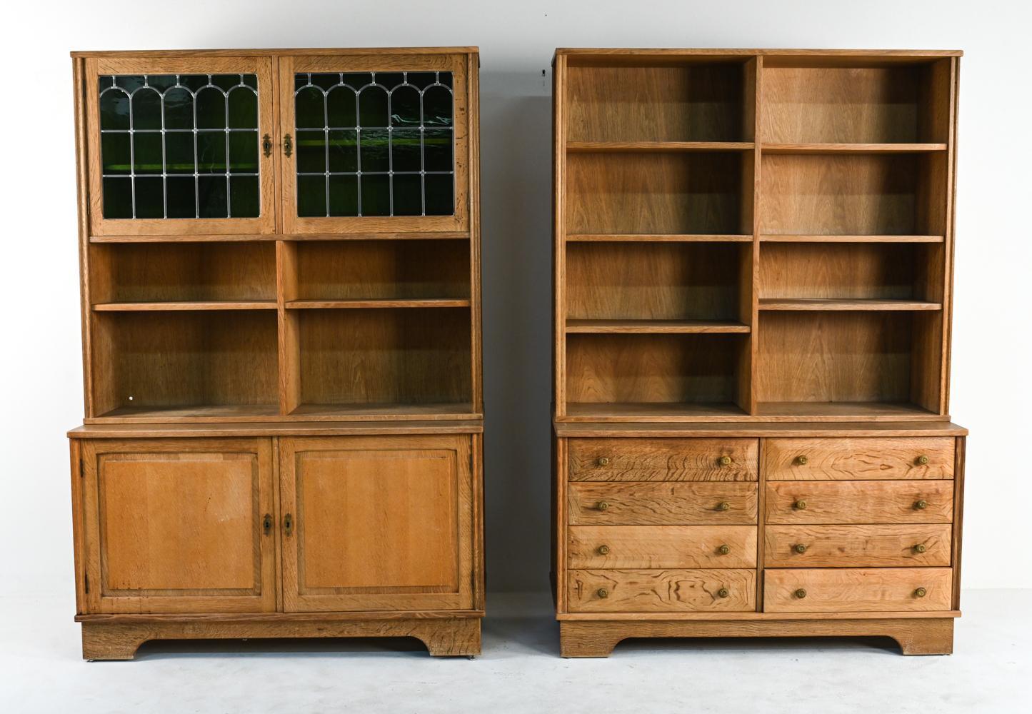 Two gorgeous Danish mid-century farmhouse provincial-style cabinets, each in two-part construction for easier transport. One with bookcase shelves above two sets of drawers; the other with green tinted leaded glass doors and shelves above two