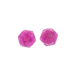 2 Hexagon-Shaped Ruby Carvings Cts 17.47