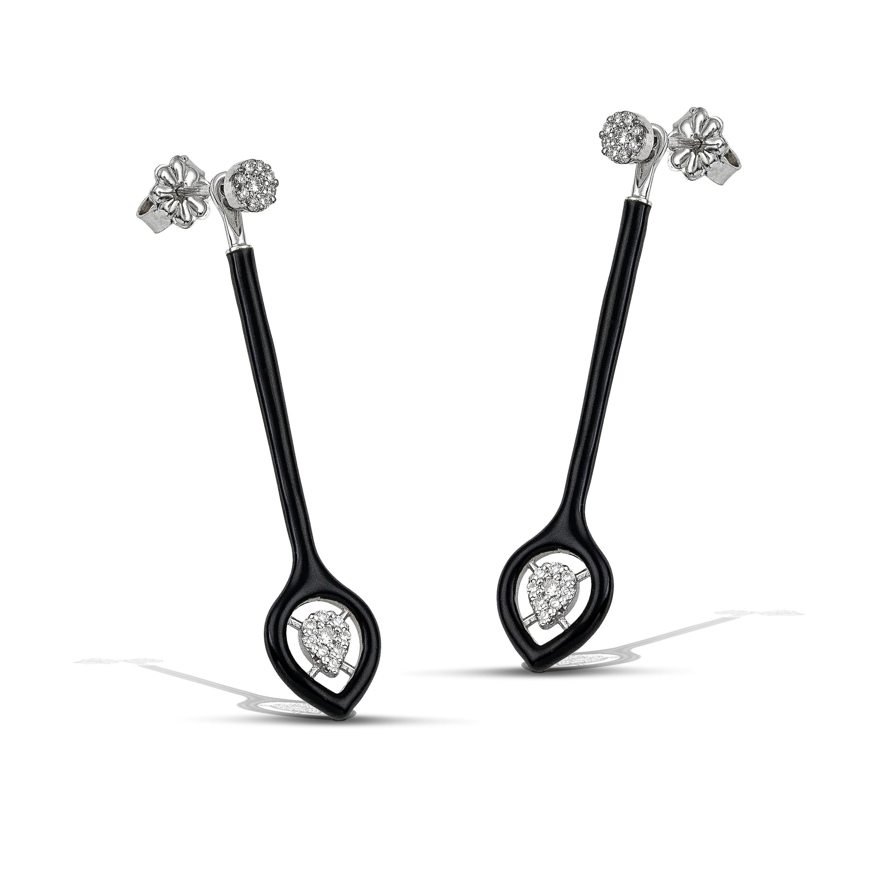 14K gold diamond earrings with a classic black colour accent, the perfect gift for yourself or a loved one.
100% Recycled 14 K White Gold
Diamonds
Black Enamel
Two in one: The long part of the earring is Removable- Detachable, allowing a beautiful