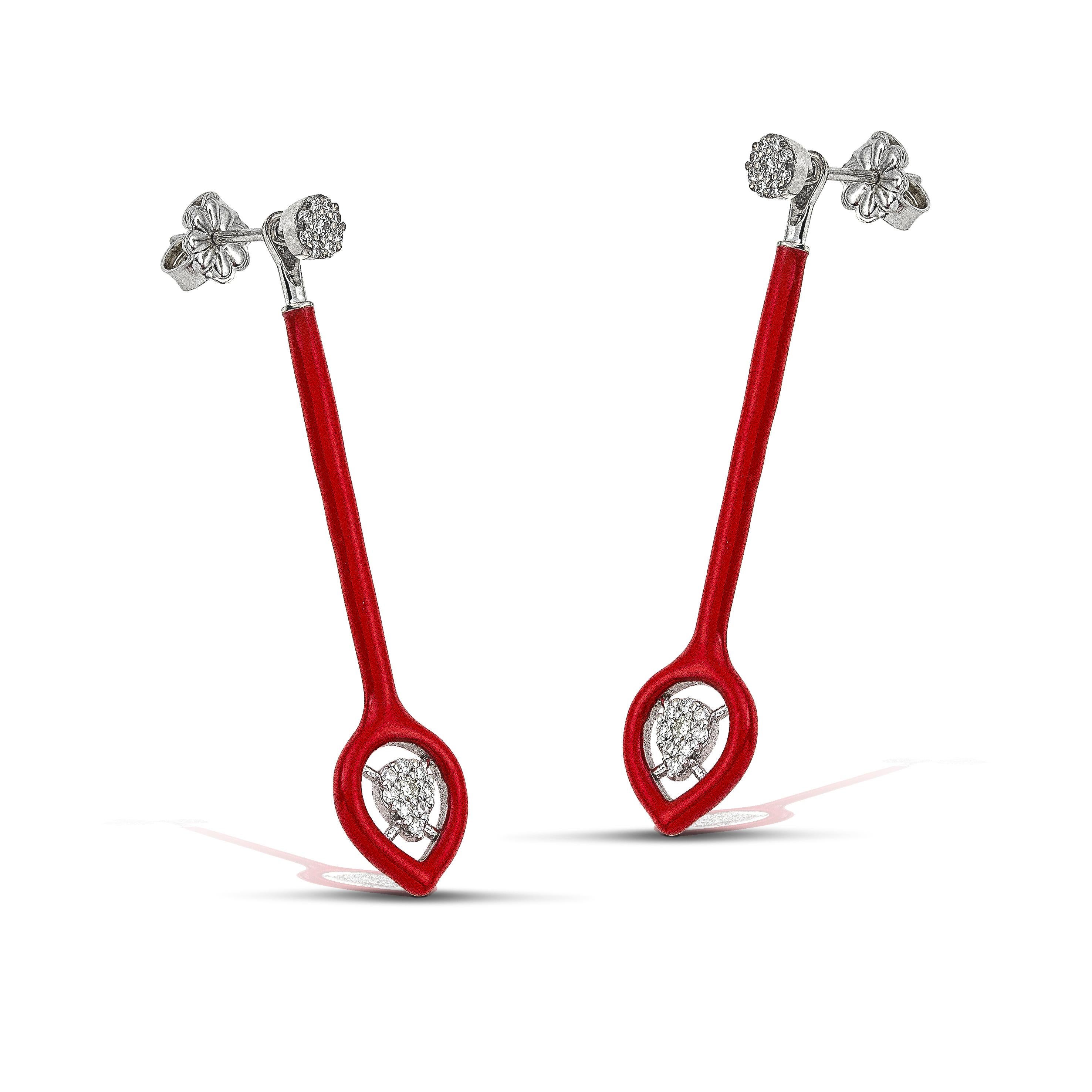 14K gold diamond earrings with an indiscreet flashy red colour accent, the perfect gift for yourself or a loved one.
100% Recycled 14 K White Gold
Diamonds
Red Enamel
Two in one: The long part of the earring is Removable- Detachable, allowing a