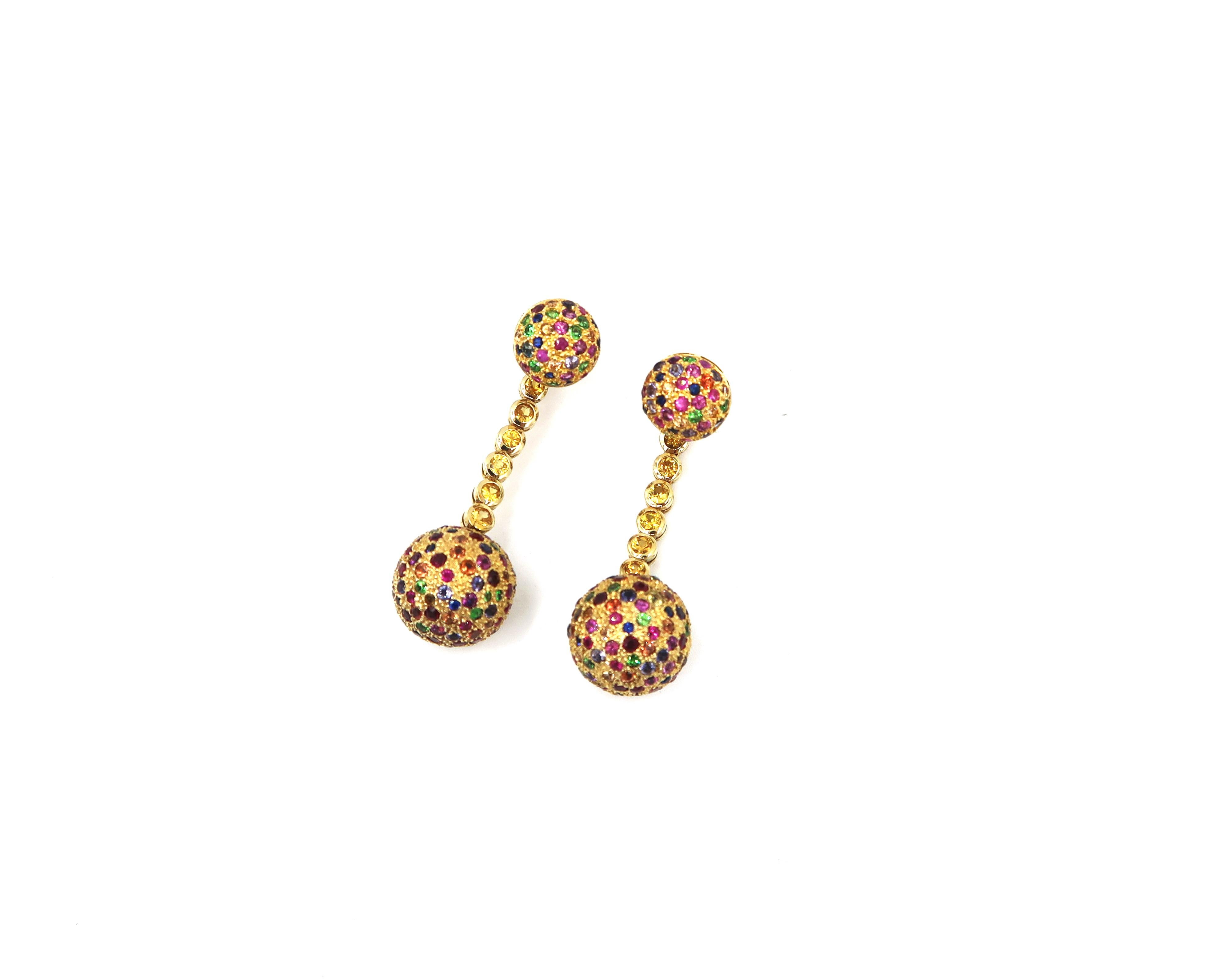 Multi Colour Gems Dangle Earrings in 18K Yellow Gold with Detachable Hanging Drops

The earrings can be worn as studs too. 

Gold : 18K Yellow Gold 19.316g.
Colour Gems : 7.48cts.
Yellow Sapphire : 0.93ct.
