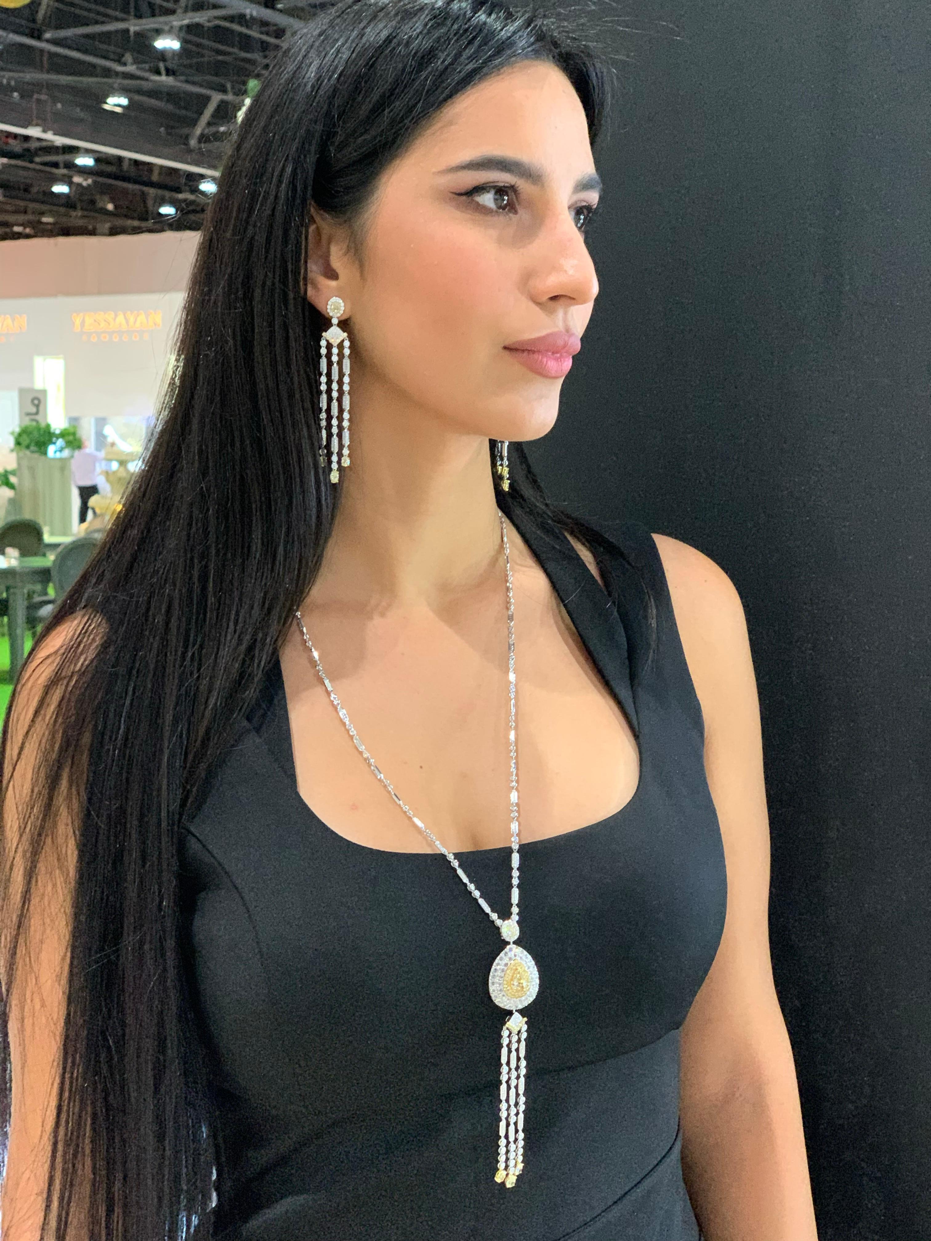 This collection is called a 'Symphony of Lights' because of the brightness that these yellow diamonds radiate whilst they are set in yellow gold. This is a playful necklace which elegantly dangles and are perfect for fancy occasions when you need a