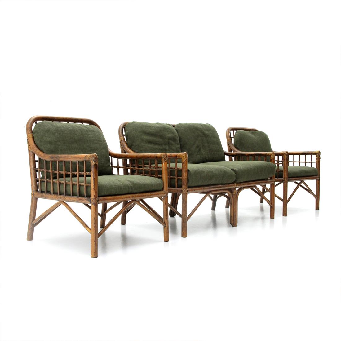 Pair of Italian manufactured armchairs and sofa produced in the 1970s.
Bamboo structure woven with rattan.
Seat and backrest made up of padded cushions lined with new green fabric.
Good general conditions, some signs due to normal use over