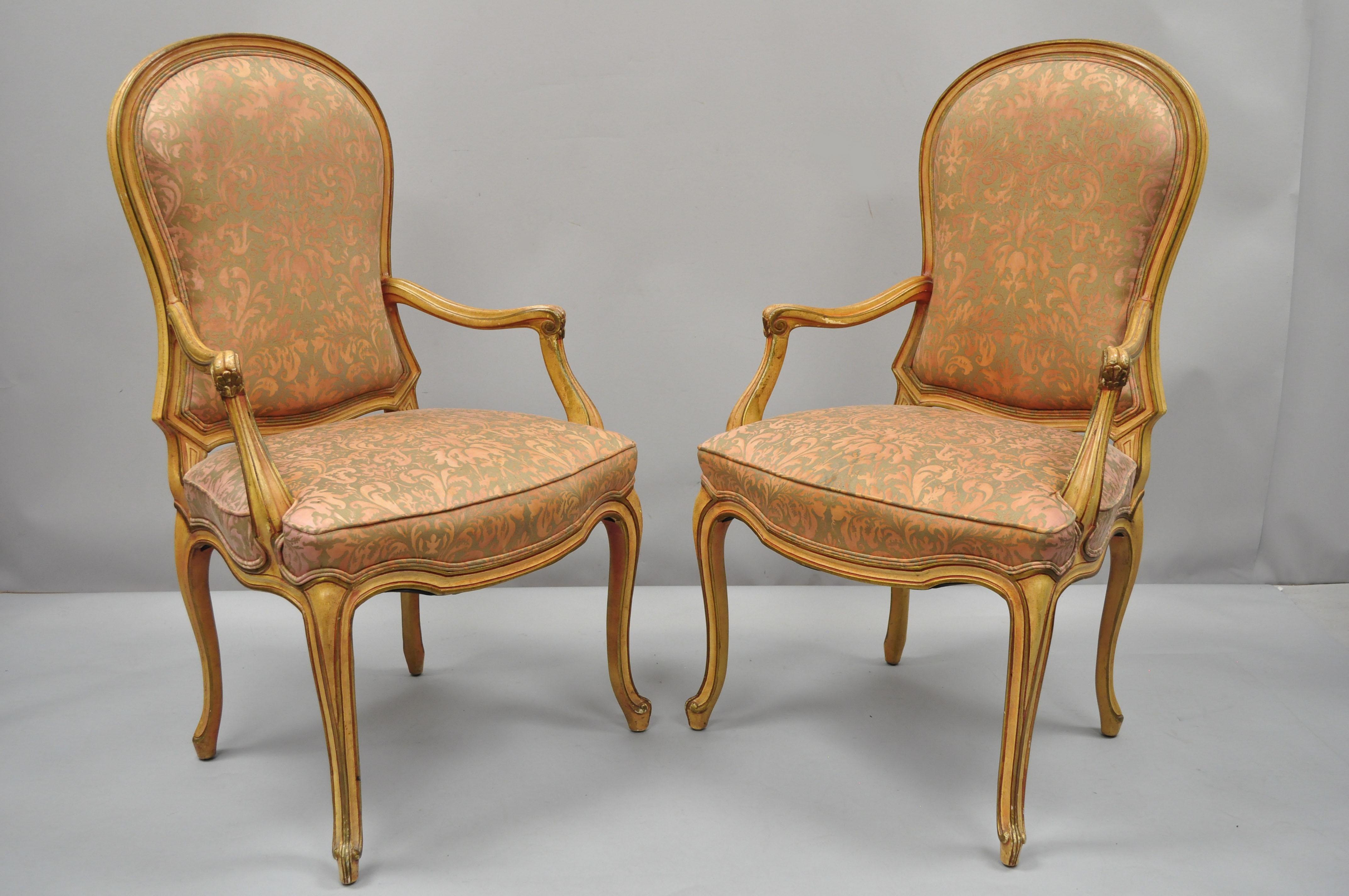 2 vintage Italian Provincial French Hollywood Regency style upholstered dining armchairs. Item features solid wood construction, upholstered back and seats, distressed finish, cabriole legs, quality craftsmanship, great style and form, circa