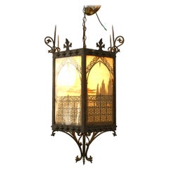 2 Italian Renaissance Style iron and Glass Hanging Lanterns