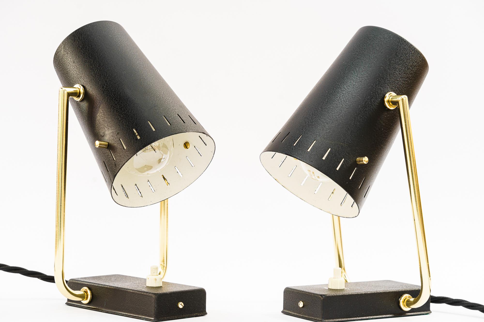 2 Italian table lamps around 1960s
Brass parts polished and stove enameled
Aluminium blackened