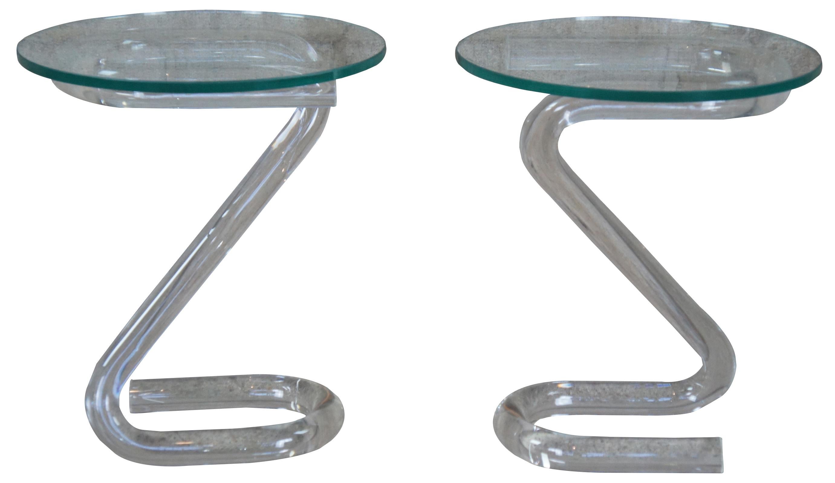 Pair of two Jeff Messerschmitt 3000 Pipe Line series Lucite and round glass tables. Made in 1975, signed on bases, #40 and #41.

Provenance: Estate of Carol Levitan and Jesse Philips
Mr. Philips was both a retailer, as an owner of a Dayton