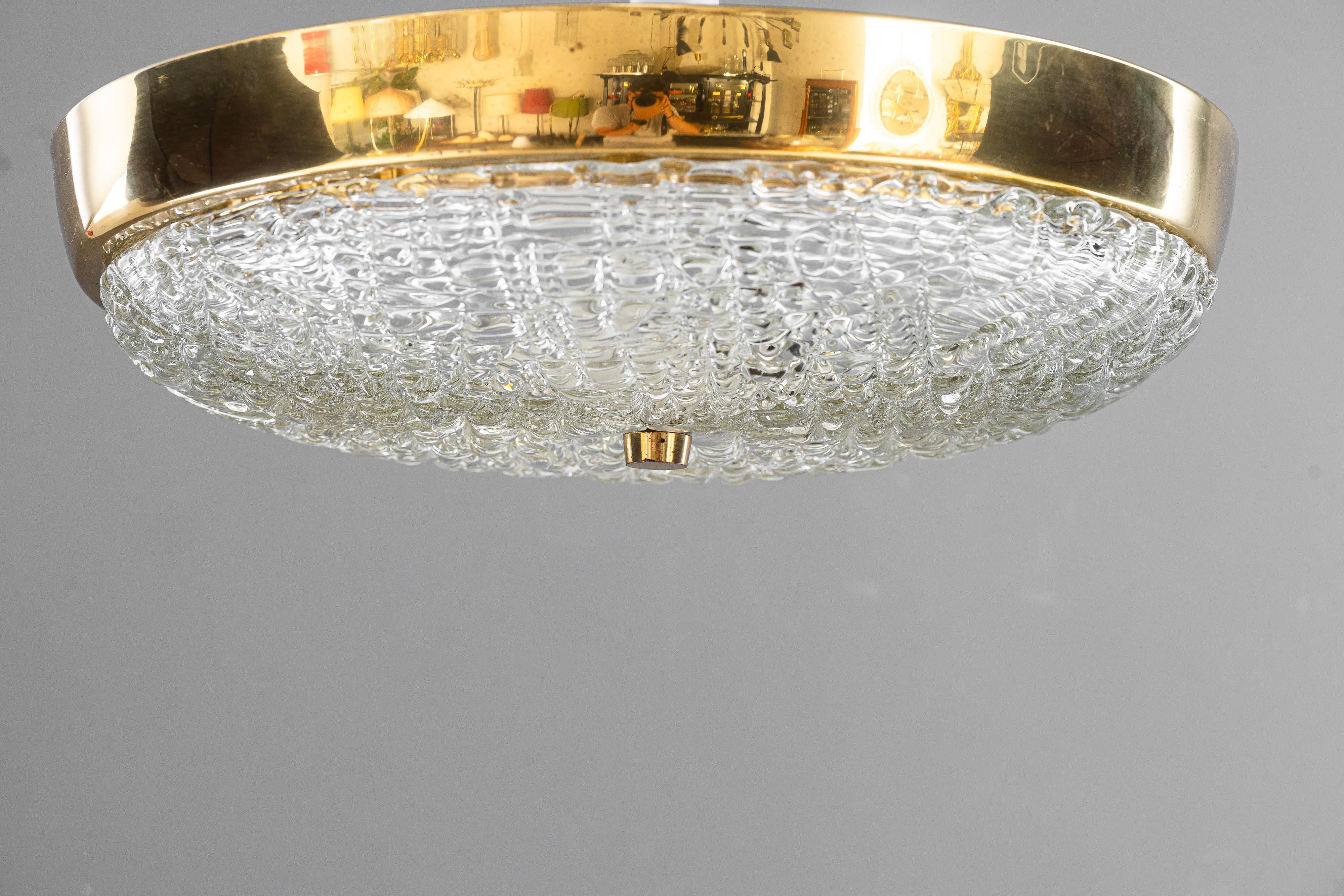 2 Kalmar ceiling lamps with structure glass vienna around 1920s
Brass polished and stove enameled
Original glass shades