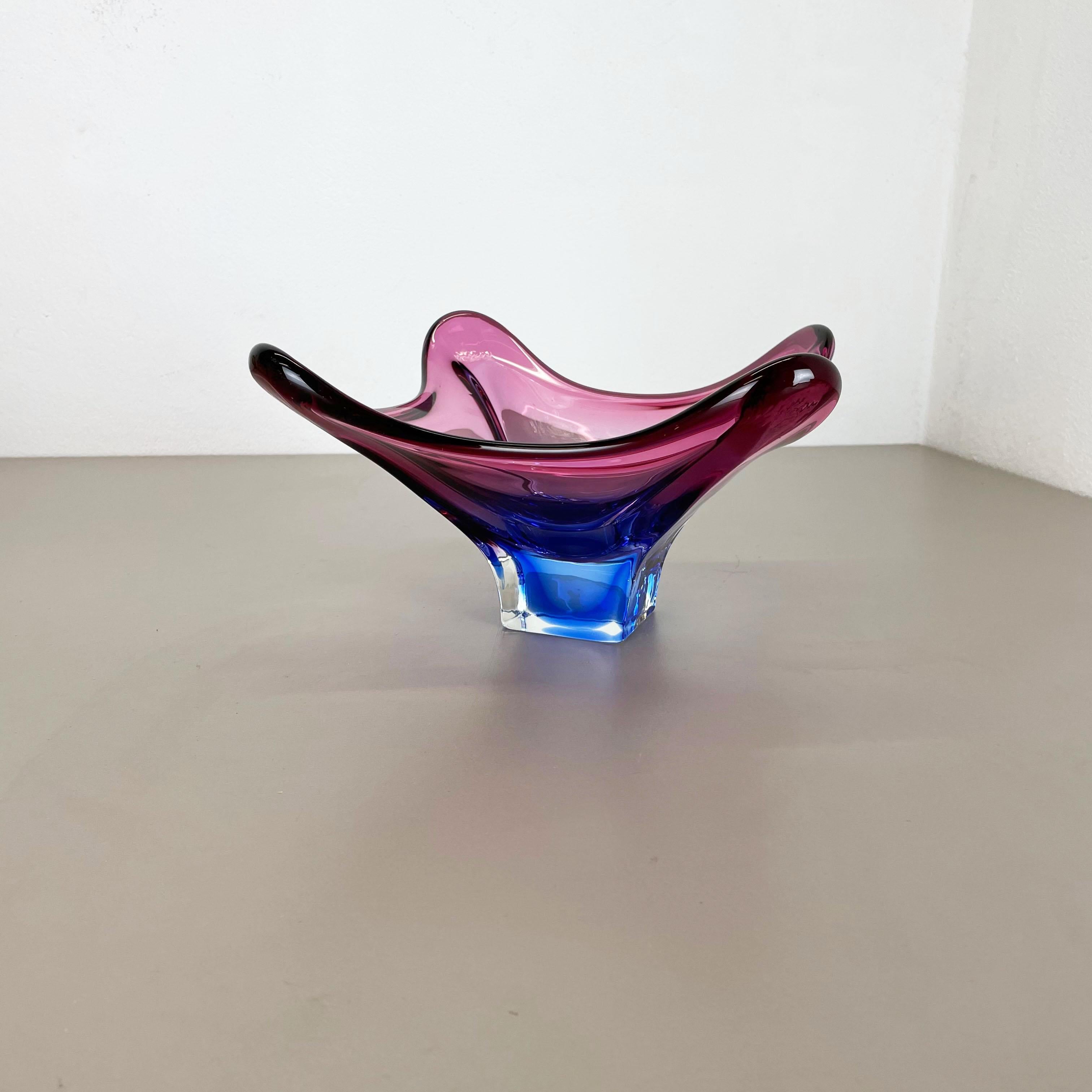 Article:

Murano glass bowl, element


Origin:

Murano, Italy


Producer:

FRATELLI TOSO


Decade:

1970s



This original vintage glass shell bowl element was produced by FRATELLI TOSO in the 1970s in Murano, Italy. It is made