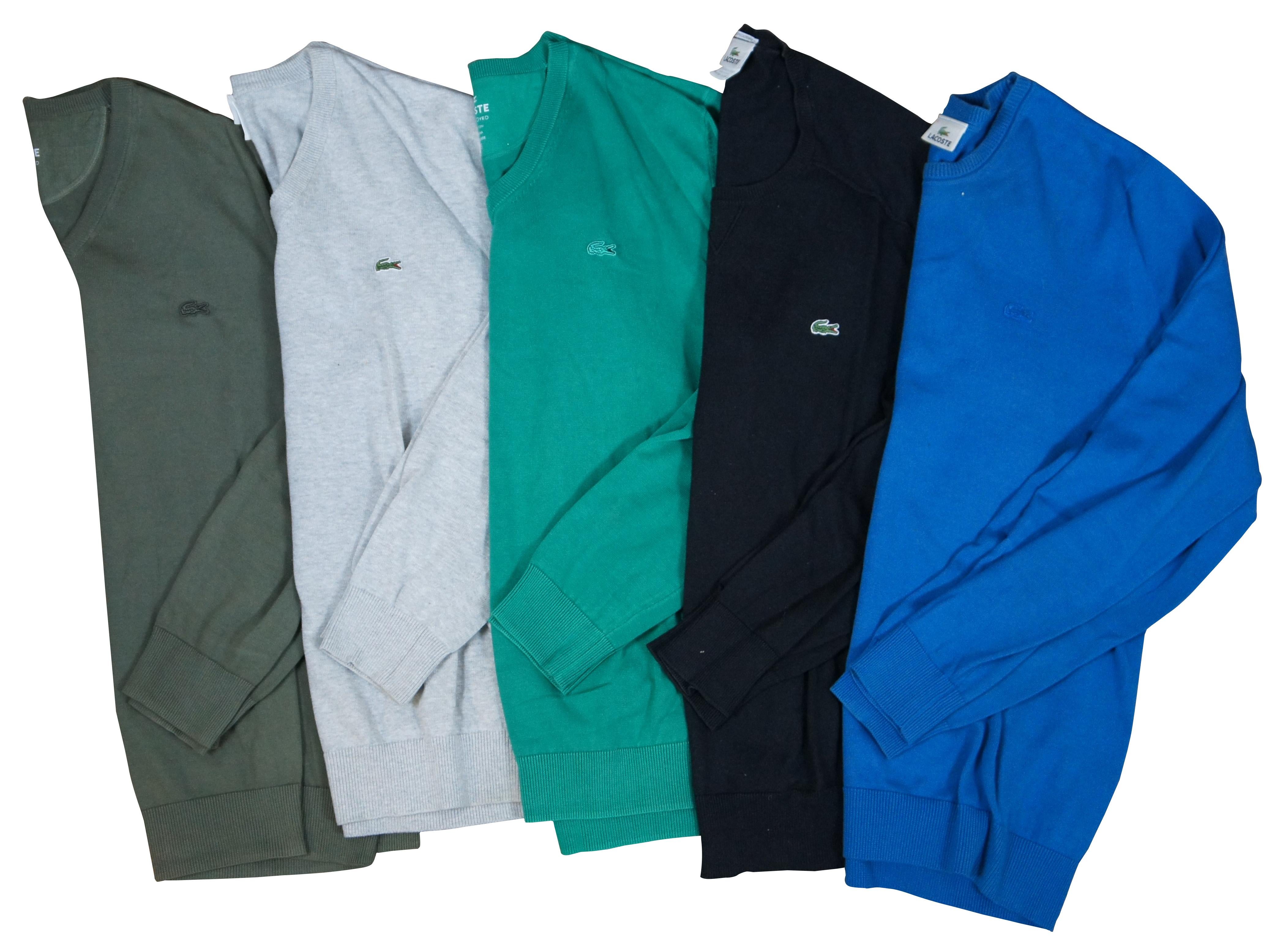 Lot of five Lacoste mens long sleeve pull over cotton sweaters, three V neck and 2 crew neck; colors include olive green, light gray, kelly green, black and blue.

Size 5 / Large / Shoulders - 17.5” / Arm Length - 27” / Chest - 46” / Back Length –