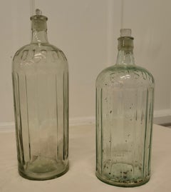 2 Large 19th Century Clear Glass Pharmacy Poison Bottles