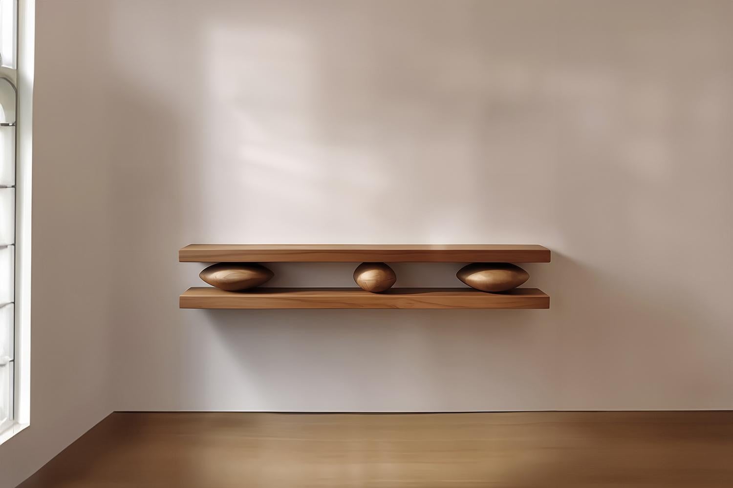 Set of Two Large Floating Shelves with Three Sculptural Wooden Pebble Accents in the Middle, Sereno by Joel Escalona

—

What happens when the practical becomes art?
What happens when ornamentation gains significance?

Those were the questions Joel