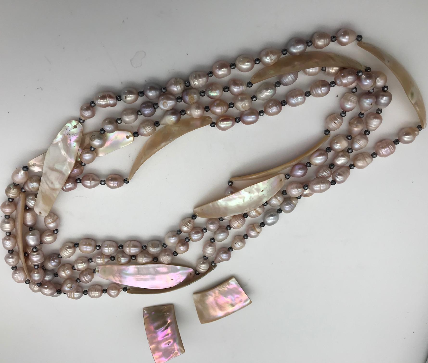 2 Large Pink Pearl Necklaces with Pink French Deco nacre pieces and matching clip Earrings. The pink  nacre used in design of this Necklace is no longer possible to find, due to disappearance of a large Turbo snails. The pearls are exceptionally