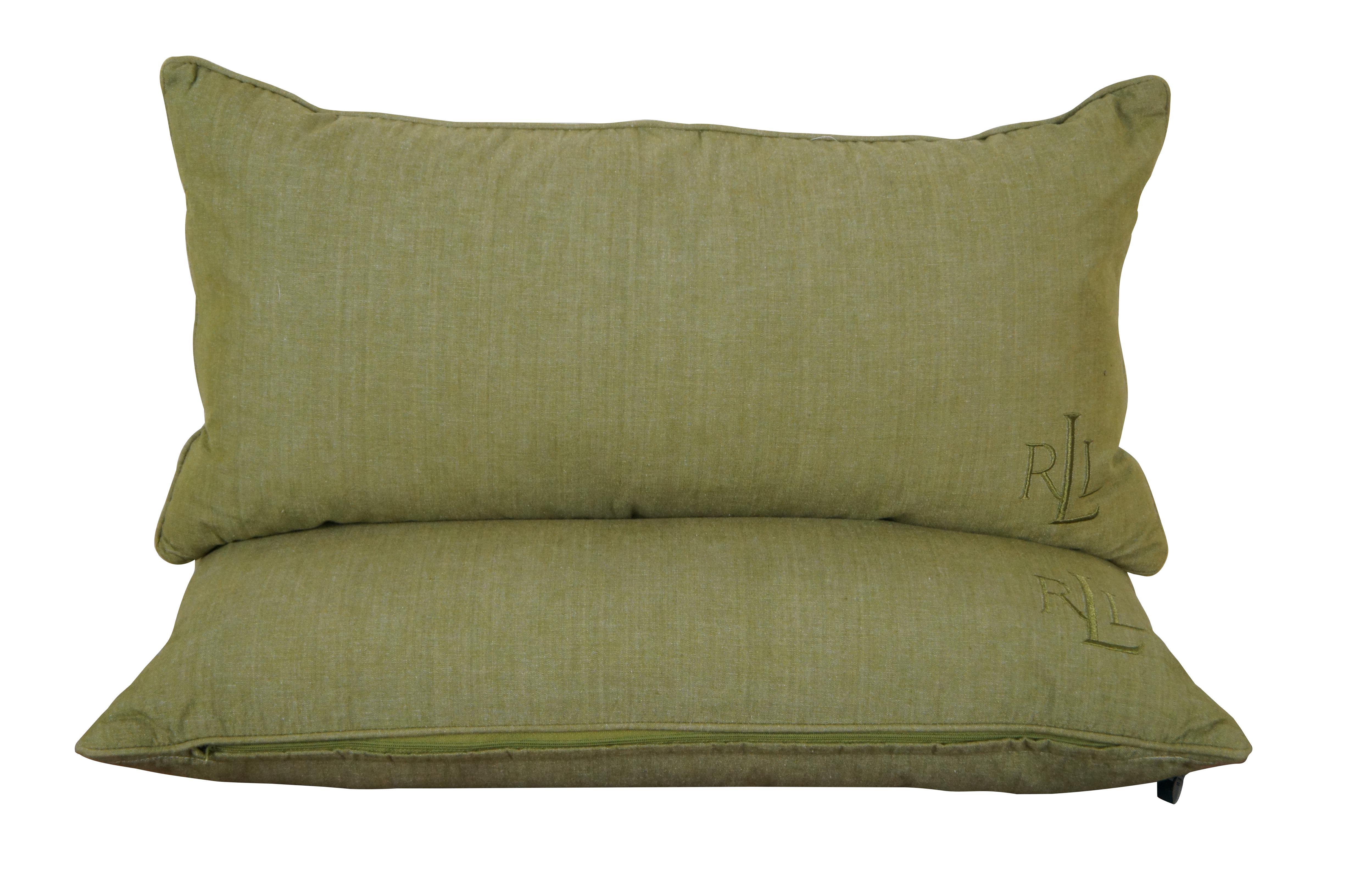 Pair of Lauren by Ralph Lauren light olive green lumbar throw pillows; rectangular with piped edge, LRL monogram in lower right corner, down filled, zipper closure. Measures: 24 x 14