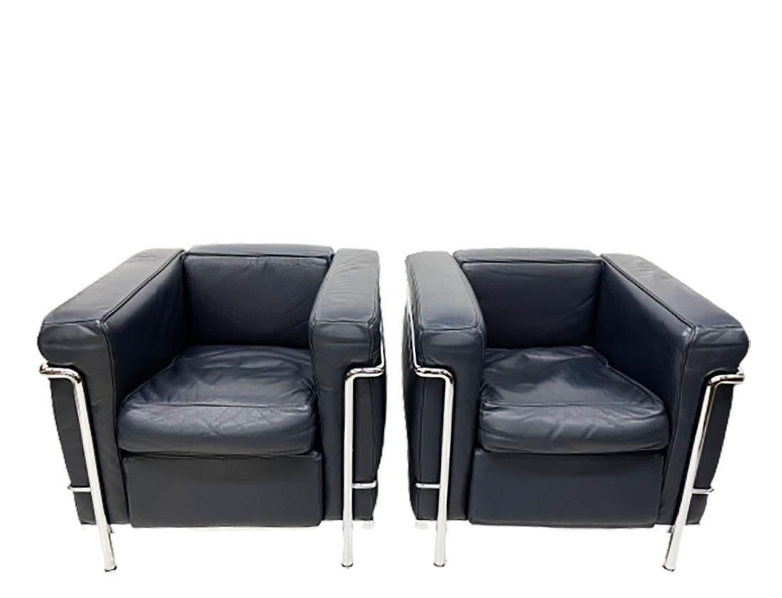 2 LC2 chairs by Le Corbusier, Charlotte Perriand and Pierre Jeanneret

2 LC2 chairs with chrome tube frame and blue leather upholstery loose cushions 
The chairs are in excellent vintage condition.
Marked in the frame and numbered with 54768 and