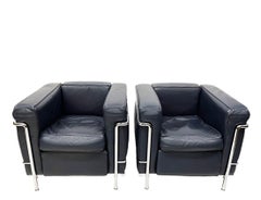 2 LC2 Chairs by Le Corbusier, Charlotte Perriand and Pierre Jeanneret