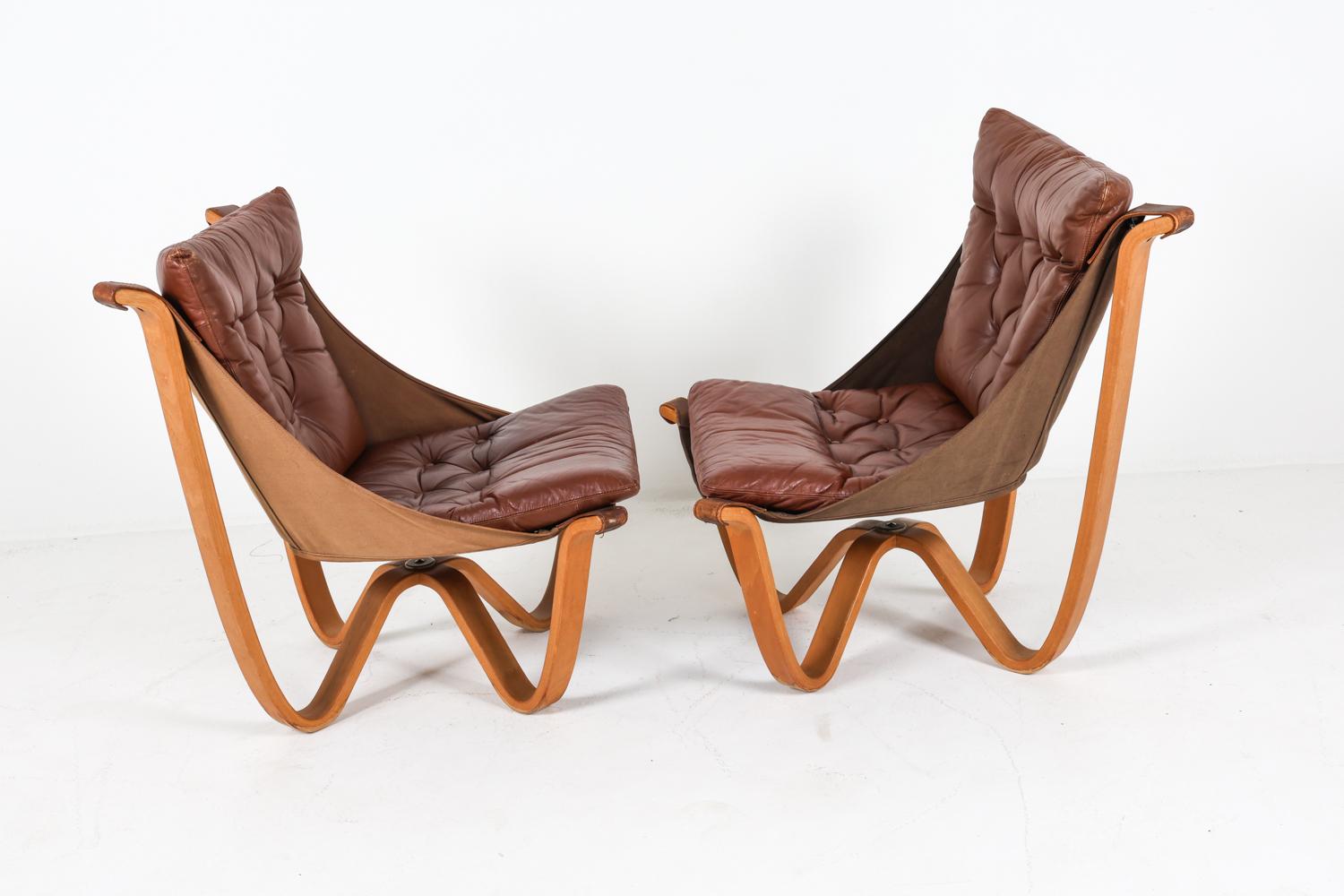 Danois (2) Chaises longues en cuir et en Beeche par Georg Thams, Danemark Circa 1970's en vente