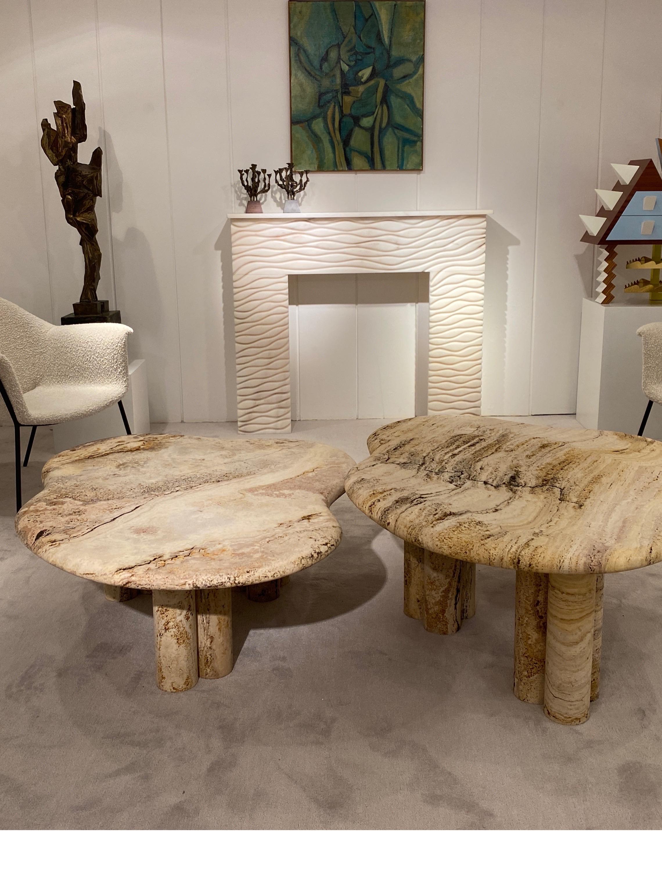 2 Coffe Tables in travertin marble  top and  feets
Signed on the feet By The  french artist Jean Frederic Bourdier
each table is diferent and hand woked
