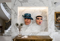 2 Masks—one of a man and one of a woman smoking 1970. For hanging on the wall