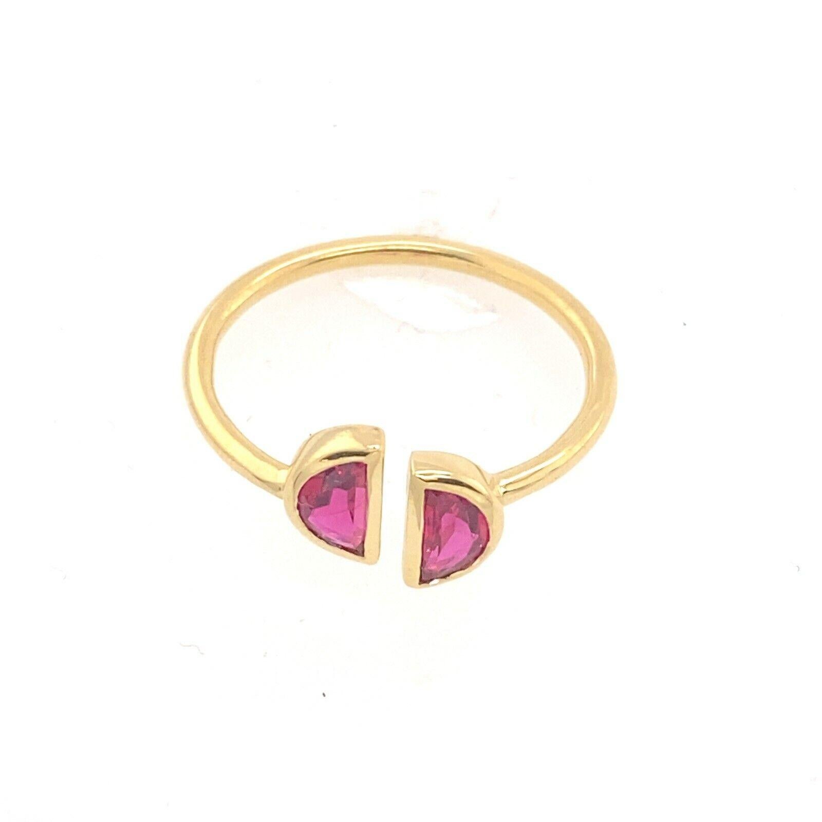 2 Matching Moon Shape Pigeon Rubies , 0.66ct Set In 18ct Yellow Gold Ring
This elegant Ruby ring features two matching pigeon cut Rubies of 0.66ct set in an 18ct Yellow Gold band. The two stones are offering a unique and contemporary