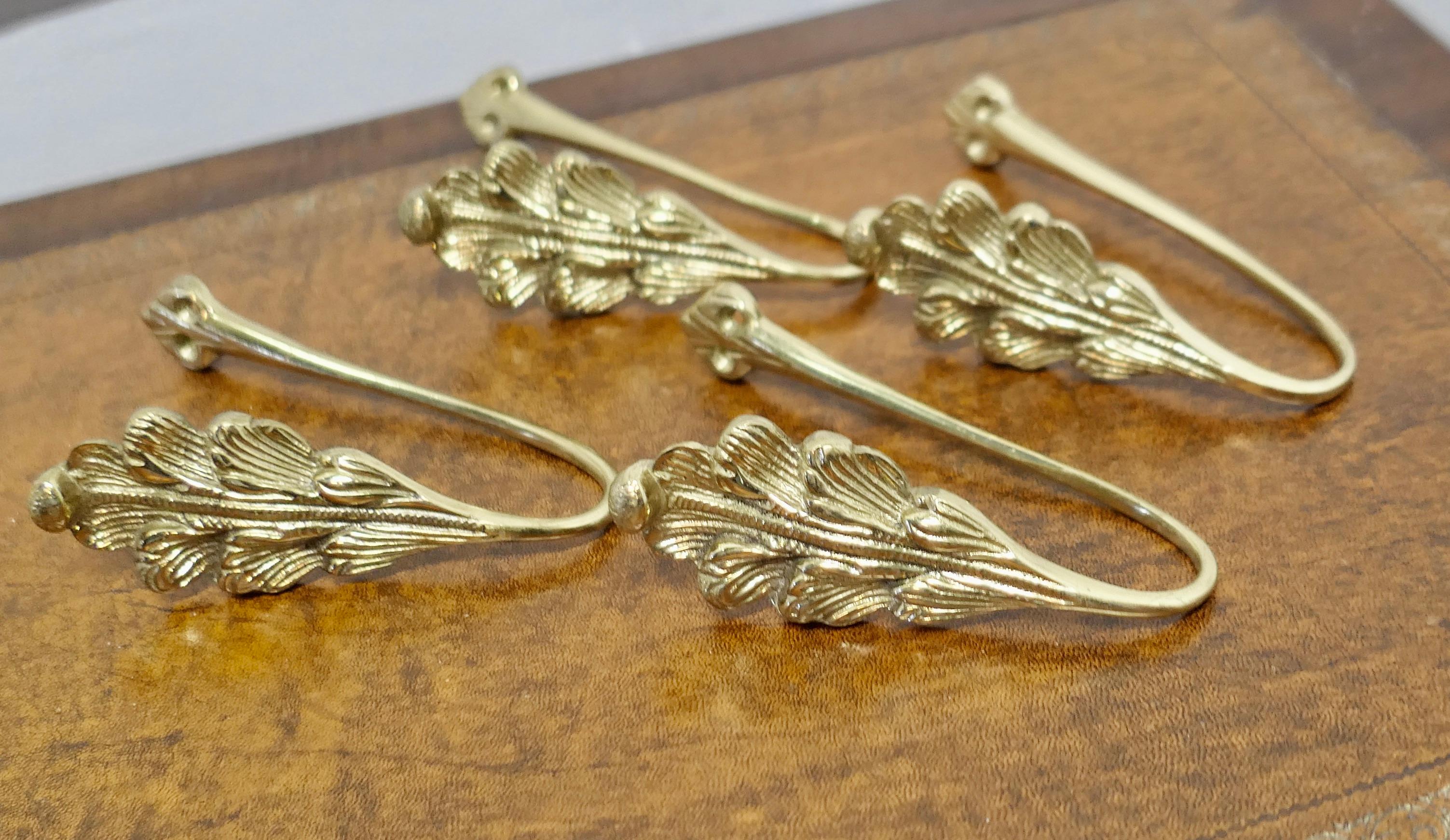 2 Matching Pairs of French Brass Curtain Tie Backs 


The Tie Backs or Hooks are solid brass, they have a leaf decoration 
The brackets have holes to fix them to the wall, they are 6” tall, and 2” and about 4” deep
VY118